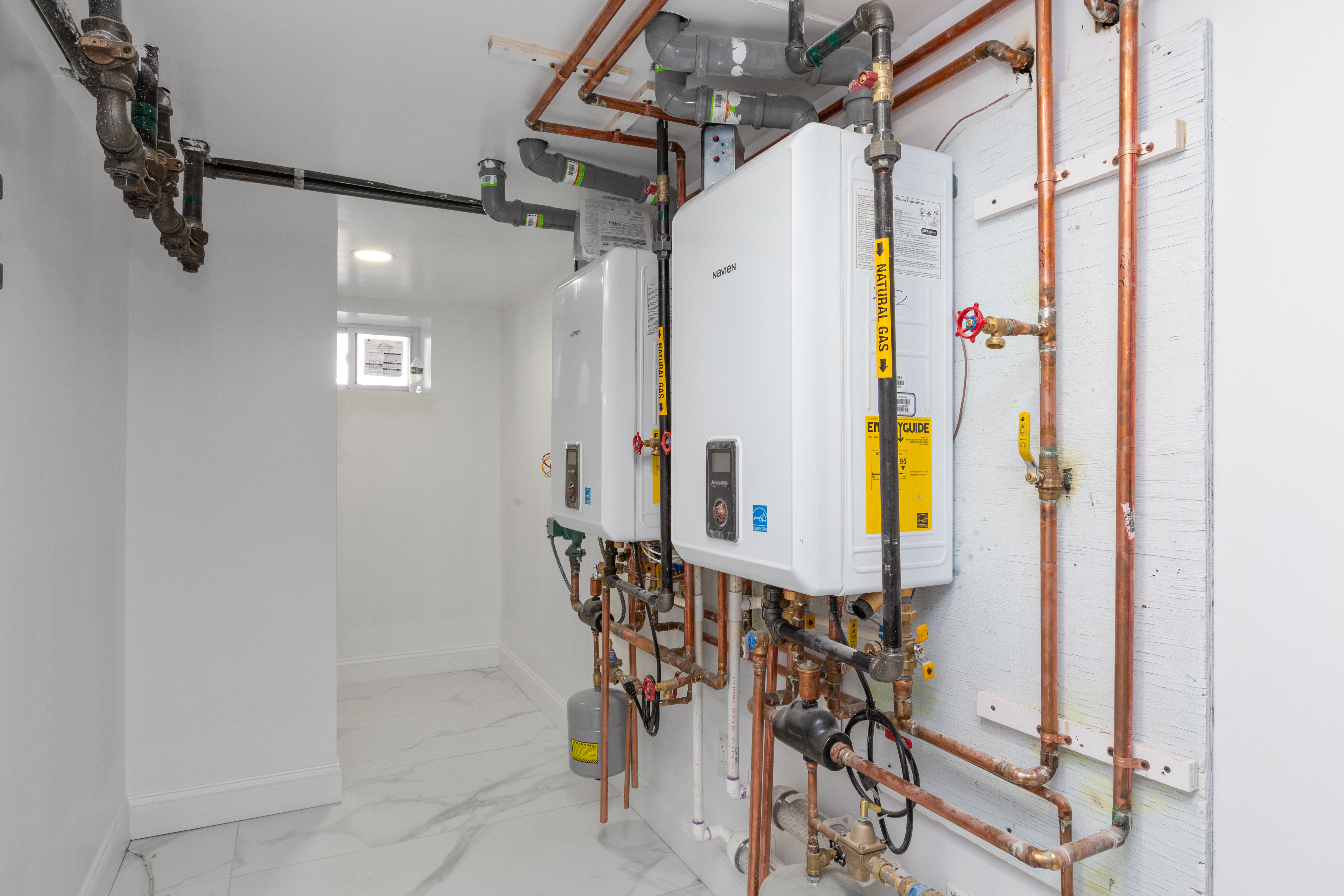 143-10 Shore Avenue Queens, NY 11435 - Photo 20 of 30 a dining room with furniture and a window