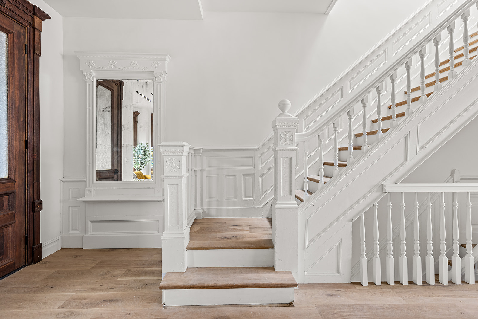 17 Linden Street Brooklyn, NY 11221 - Photo 2 of 19 a view of staircase with white walls and windows