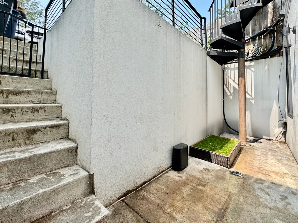 a view of backyard from a hallway