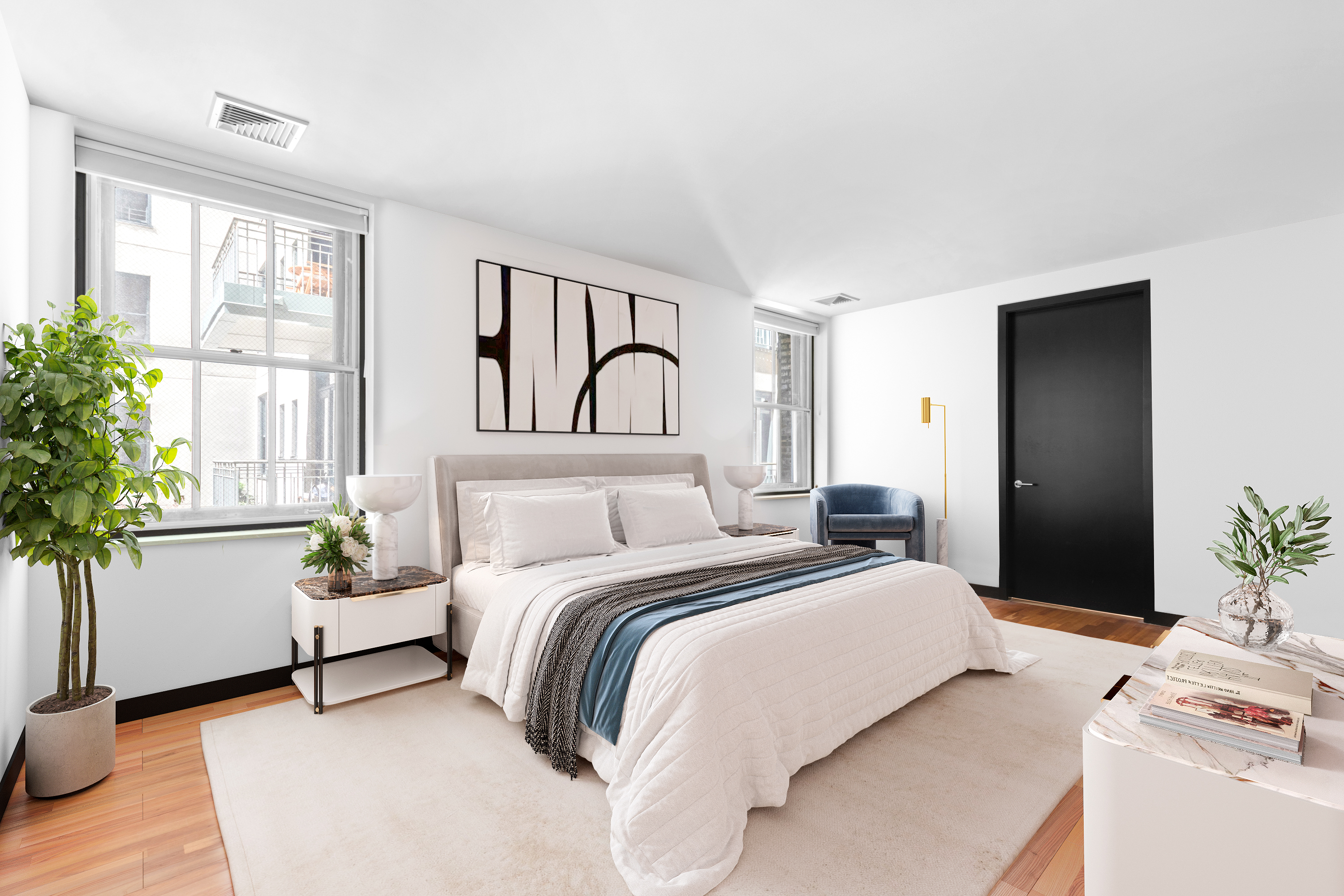 39 North Moore Street, Unit 2A Manhattan, NY 10013 - Photo 8 of 17 a bedroom with a bed and a potted plant next to a window
