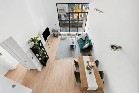 a view of living room with furniture and window
