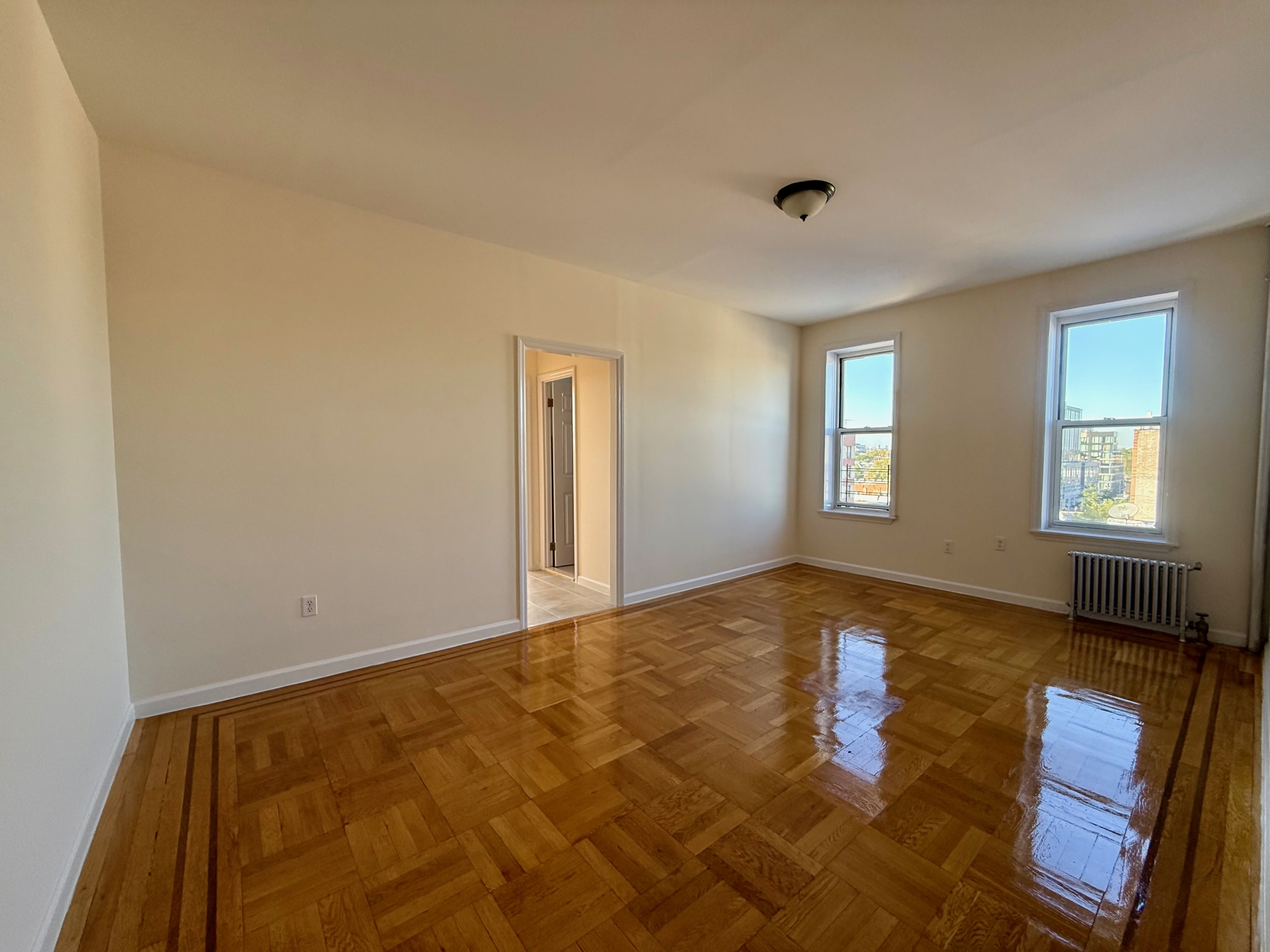 6309 Bay Parkway, Unit F5 Brooklyn, NY 11204 - Photo 2 of 7 a view of an empty room and window