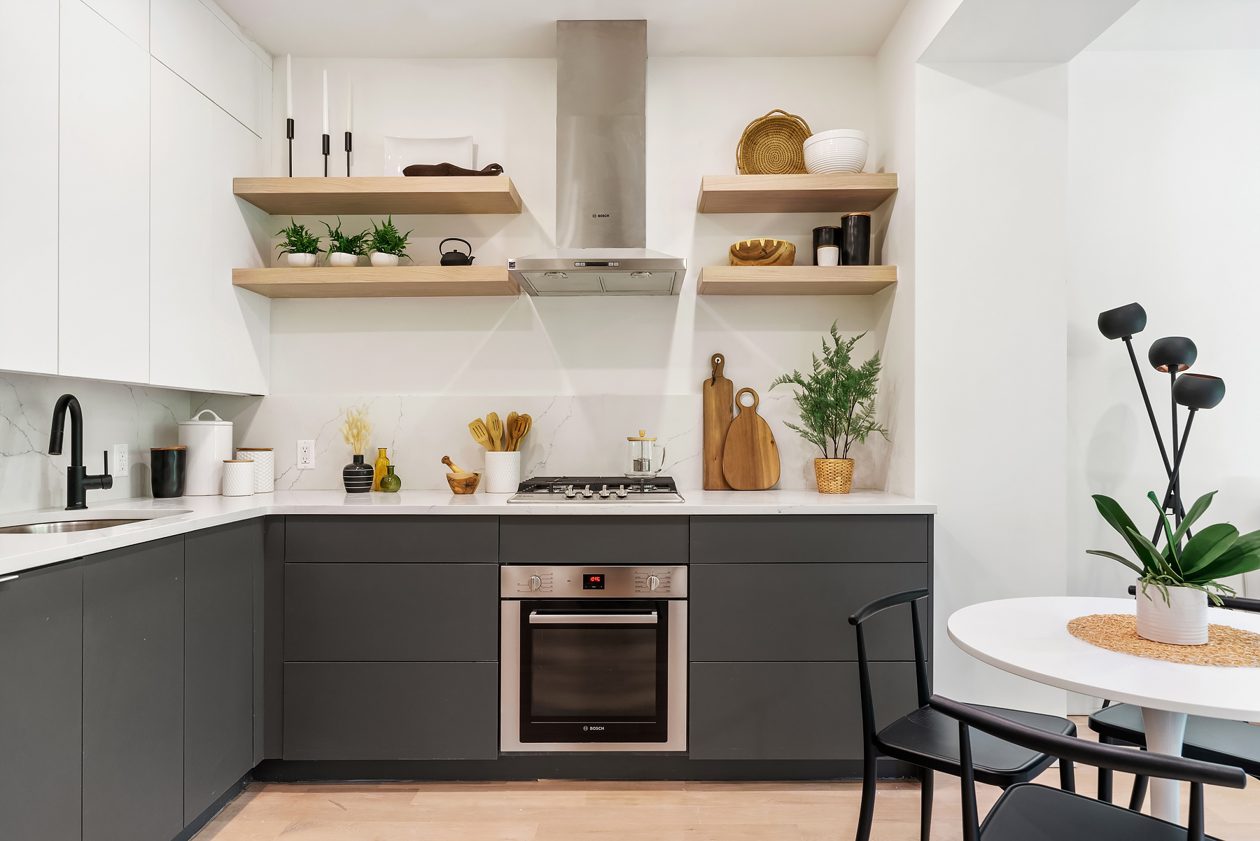 26 West 127th Street, Unit 4A Manhattan, NY 10027 - Photo 5 of 10 a kitchen with cabinets and wooden floor