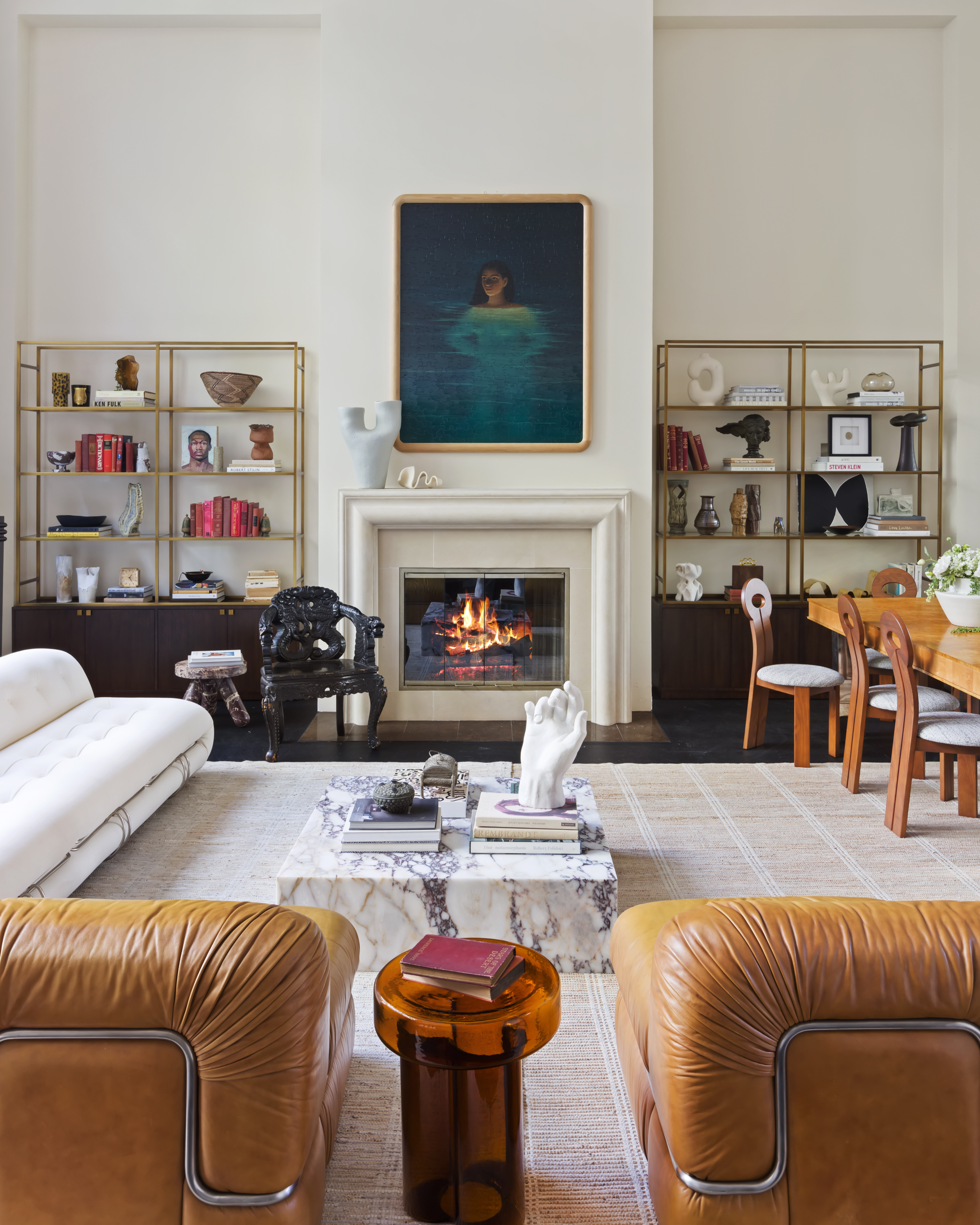 95 Charles Street, Unit TH Manhattan, NY 10014 - Photo 6 of 29 a living room with furniture a flat screen tv and a fireplace