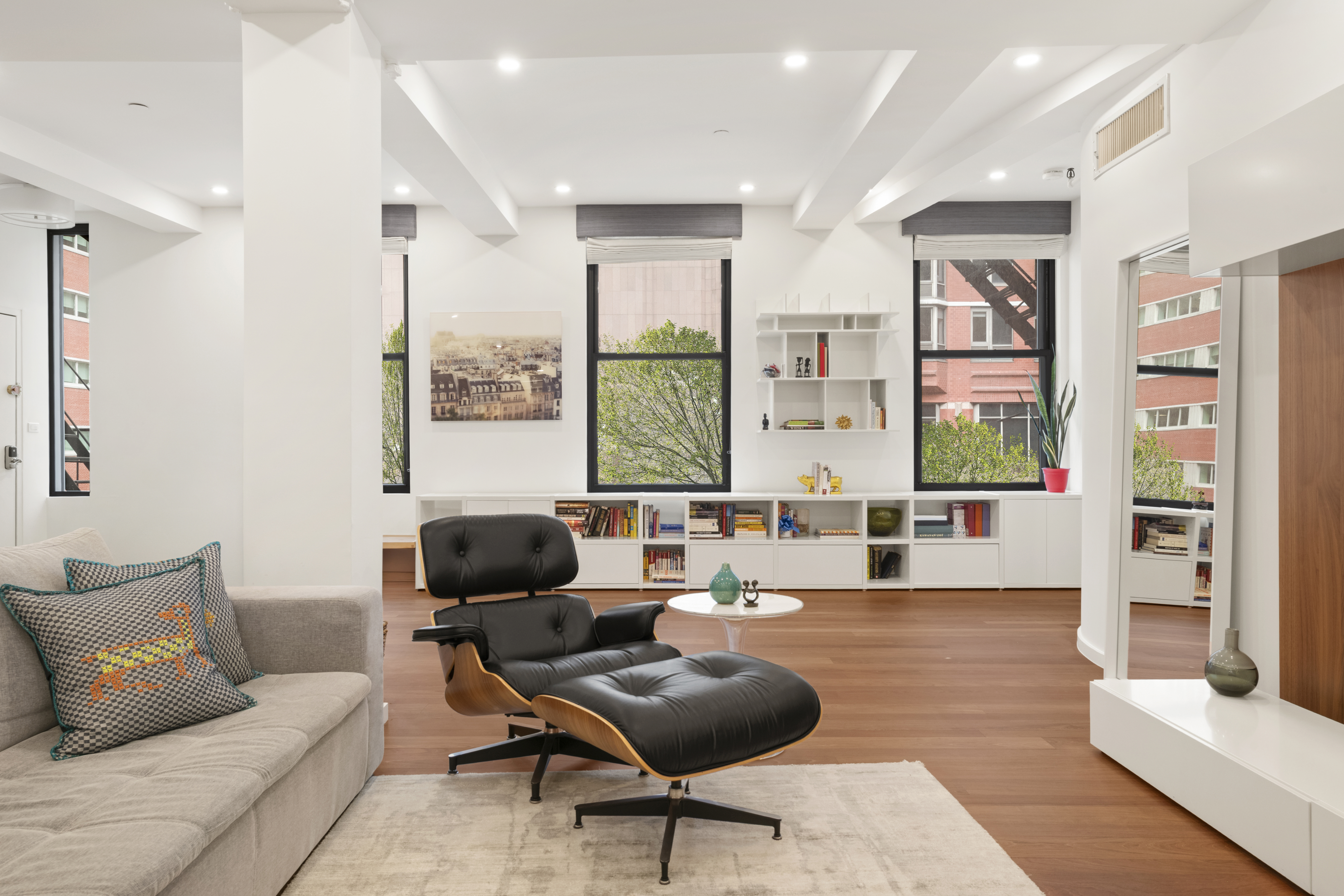 110 Duane Street, Unit 3F Manhattan, NY 10007 - Photo 11 of 14 a living room with furniture and large windows