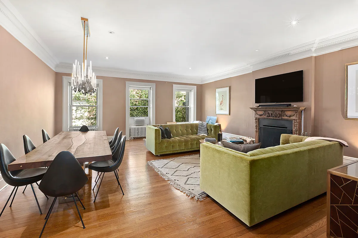 16 East 74th Street, Unit 4/5 Manhattan, NY 10021 - Photo 2 of 13 a living room with furniture a flat screen tv and a flat screen tv