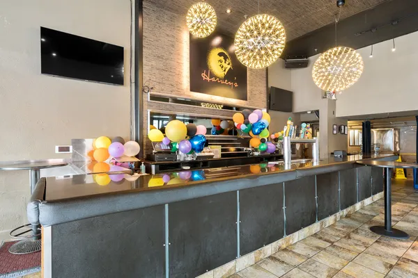 a kitchen with stainless steel appliances granite countertop a stove and a cabinets