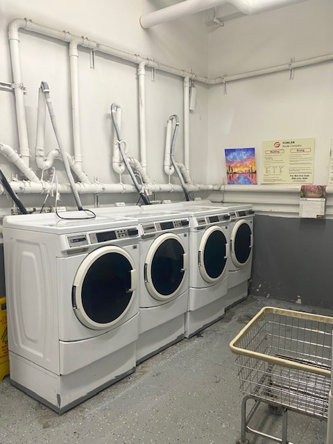 210 West 16th Street, Unit PH Manhattan, NY 10011 - Photo 14 of 16 a utility room with dryer and washer