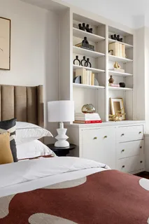 a bedroom with a bed and closet