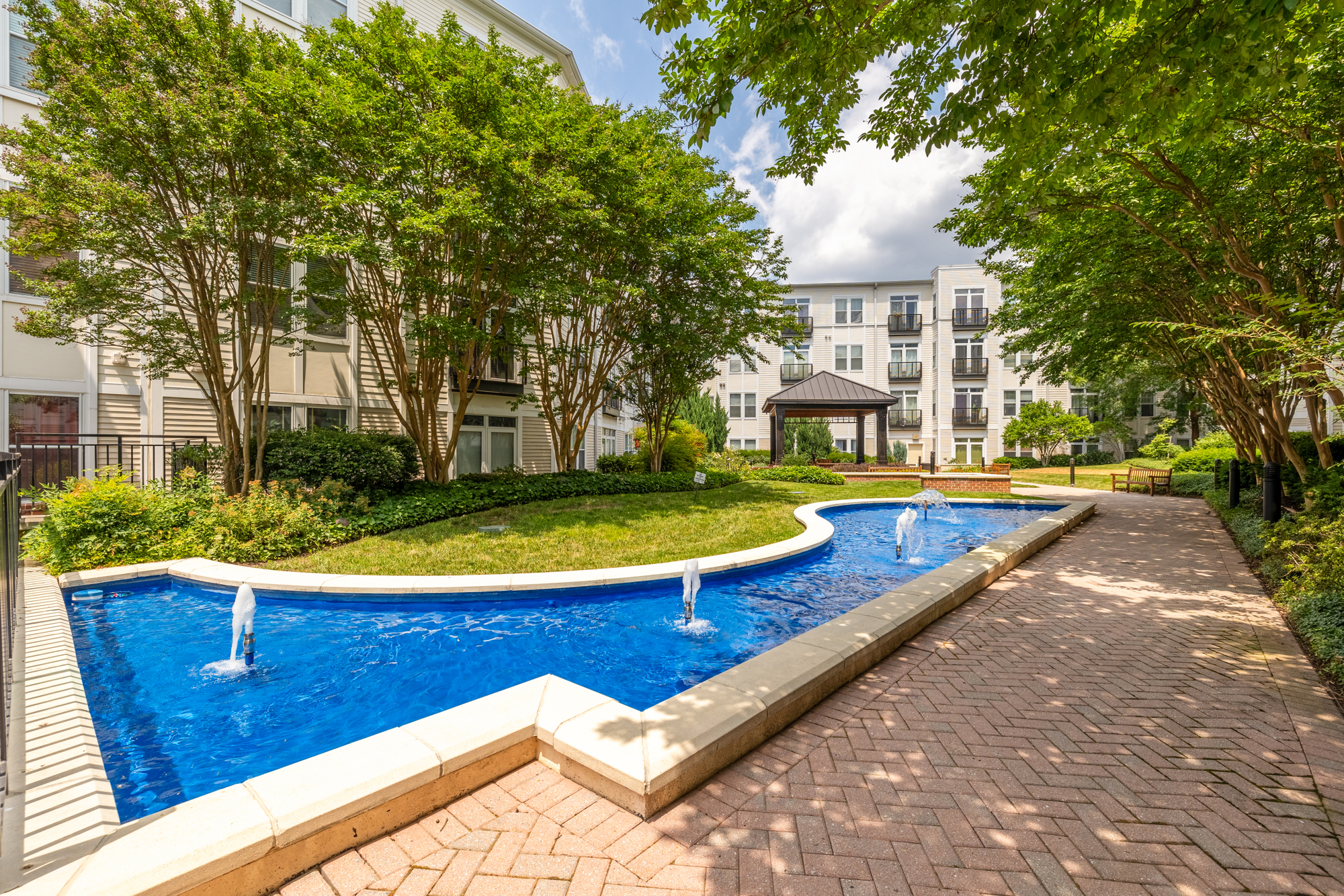 1391 Pennsylvania Ave. Southeast, Unit 324 Washington, DC 20003 - Photo 30 of 33 a view of an house with swimming pool and sitting area