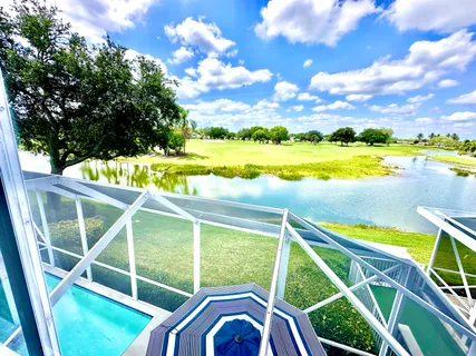 a view of a swimming pool from a balcony