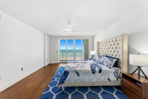 a bedroom with a bed and a walk in closet