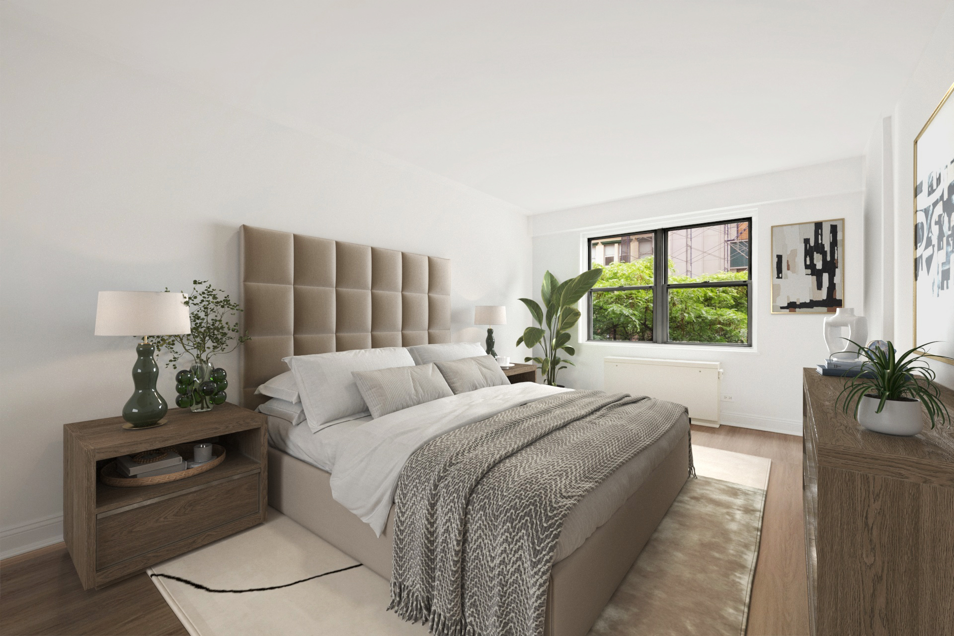 10 West 15th Street, Unit 414 Manhattan, NY 10011 - Photo 6 of 16 a bed room with a bed and a potted plant