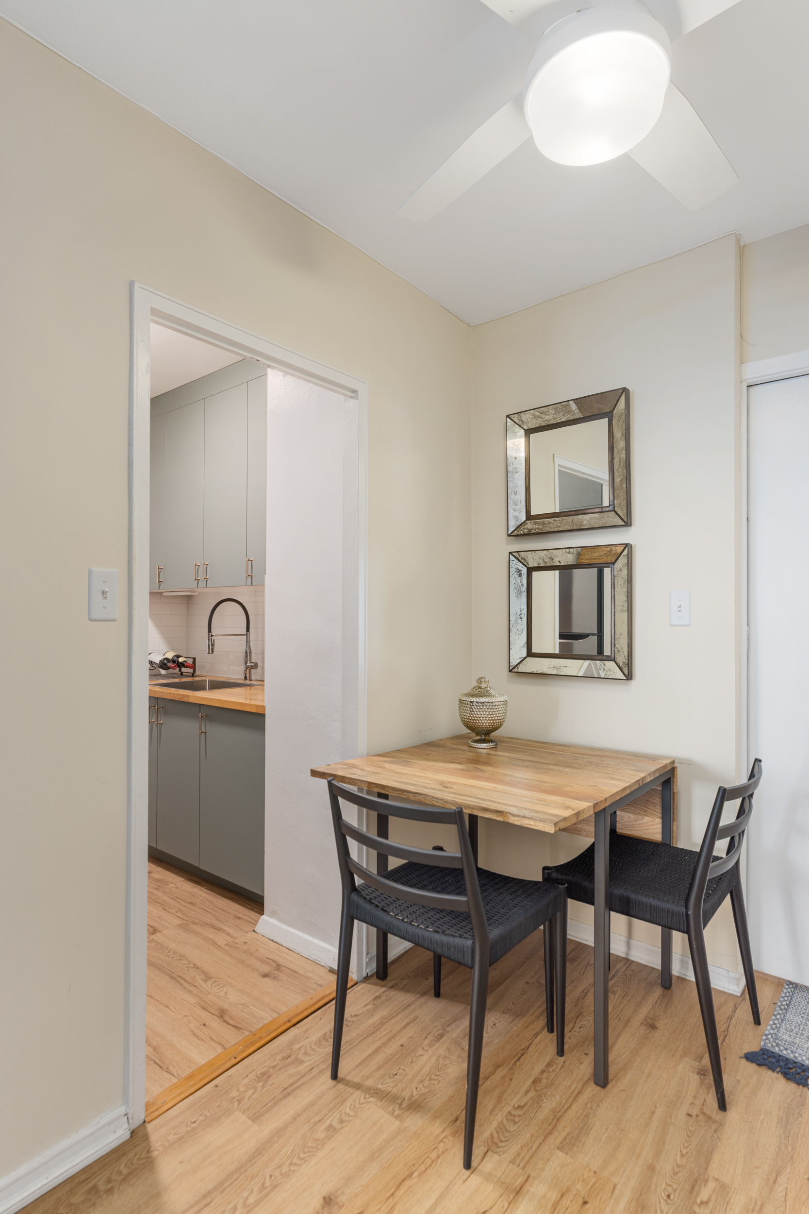 345 West 58th Street, Unit 4Y Manhattan, NY 10019 - Photo 7 of 12 a dining room with a table and chairs