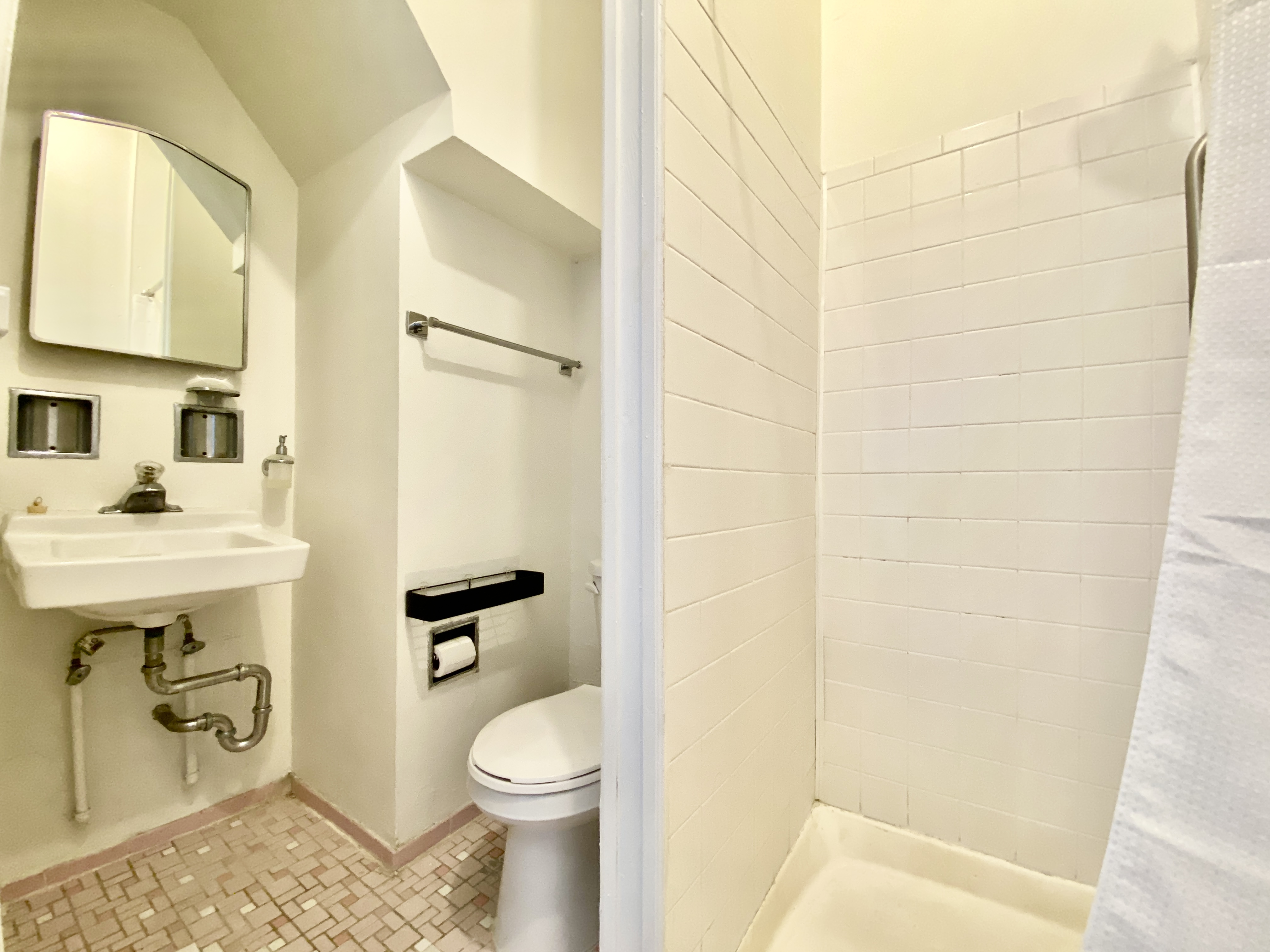 699 4th Avenue, Unit 3 Brooklyn, NY 11232 - Photo 8 of 8 a bathroom with a sink a toilet and shower