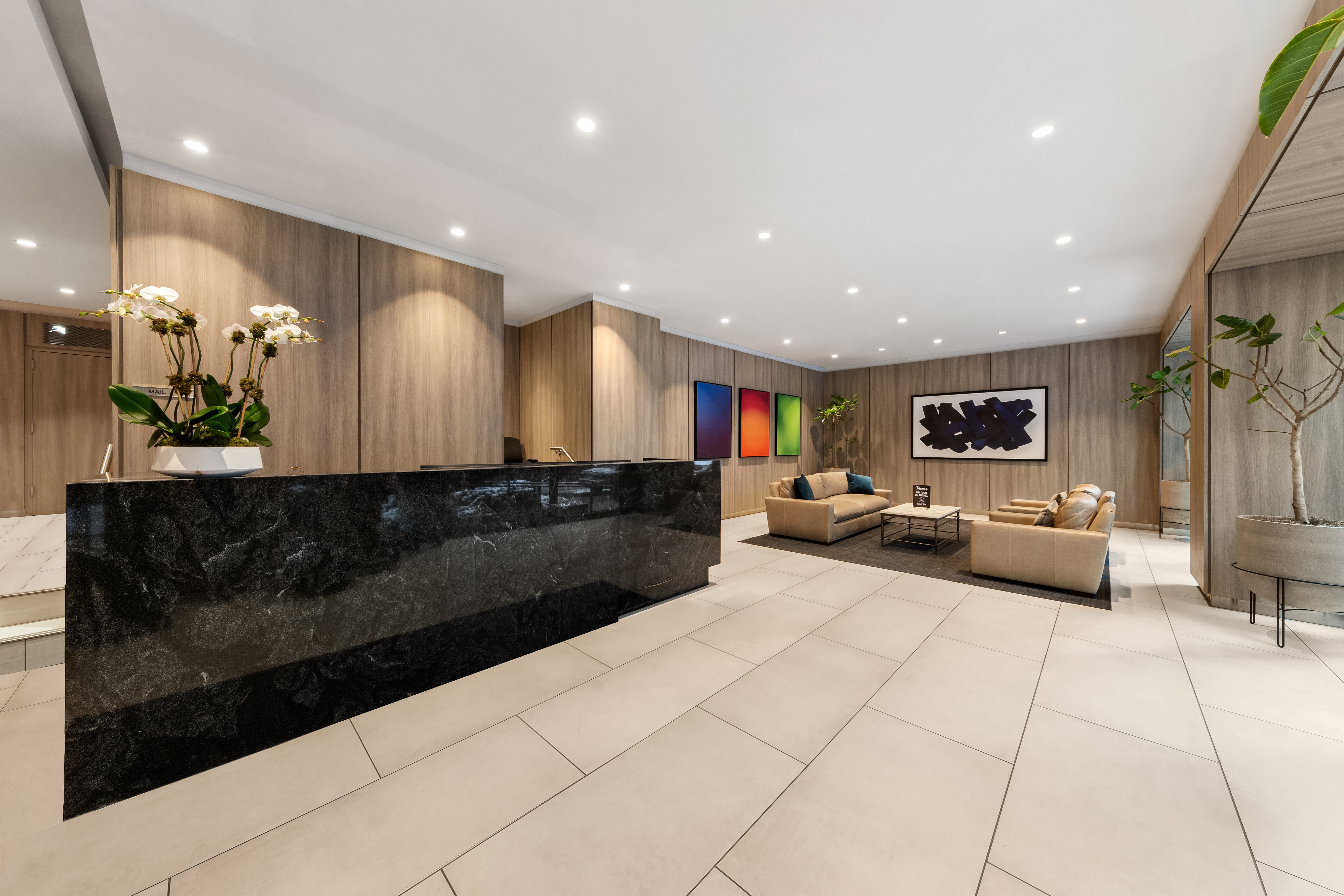 305 East 40th Street, Unit 5K Manhattan, NY 10016 - Photo 13 of 15 a living room with furniture and a flat screen tv