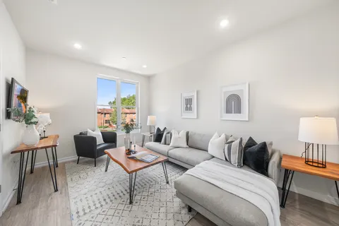 a kitchen with a table and chairs in it