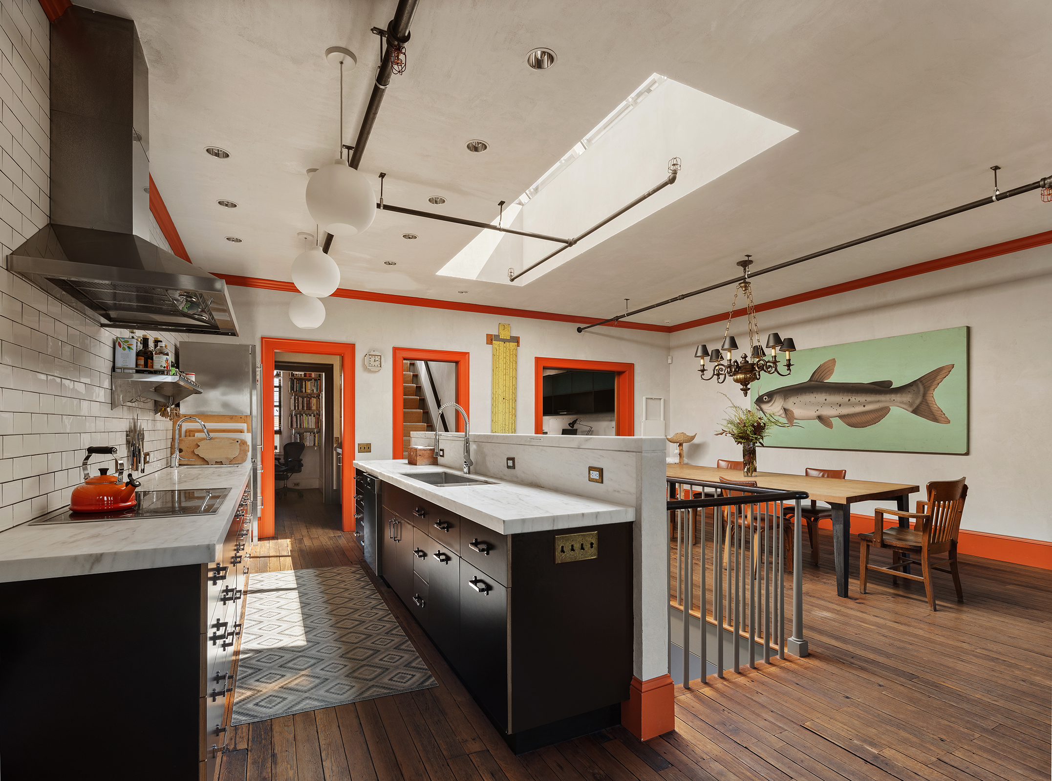 164 Coffey Street Brooklyn, NY 11231 - Photo 9 of 31 a large kitchen with stainless steel appliances granite countertop a stove oven a dining table and chairs with wooden floor