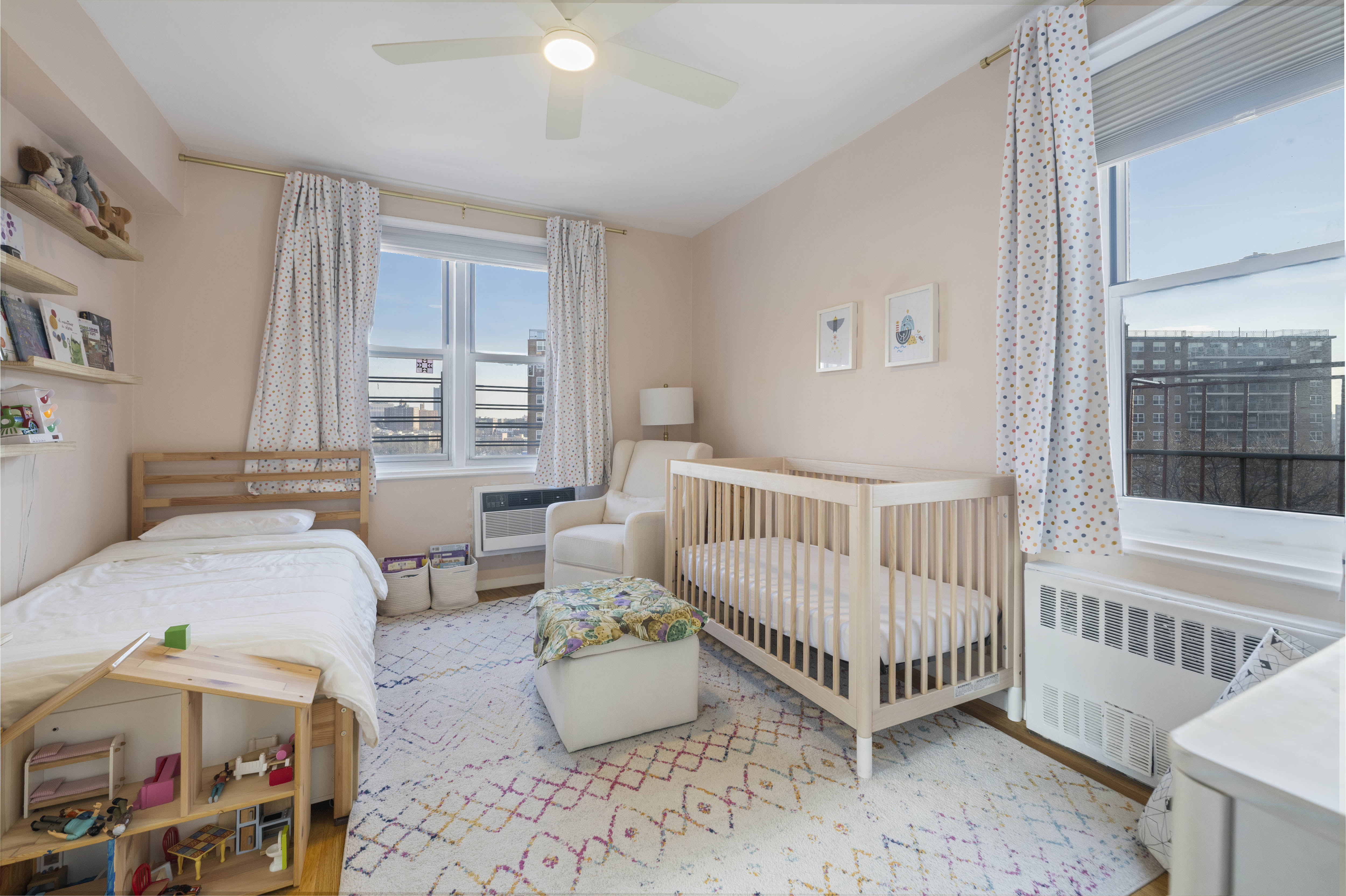 3475 Greystone Avenue, Unit 7B Bronx, NY 10463 - Photo 11 of 13 a bedroom with furniture and a window