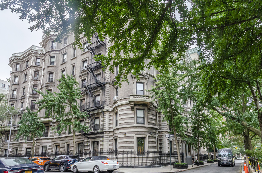 194 Riverside Drive, Unit 5C/6C Manhattan, NY 10025 - Photo 14 of 26 a front view of a building with trees