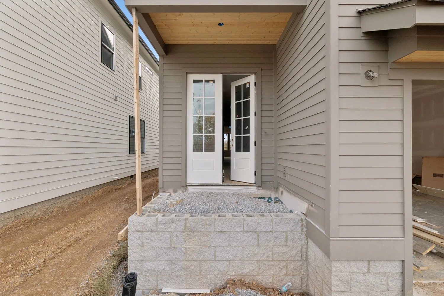 a front view of a house with a garage
