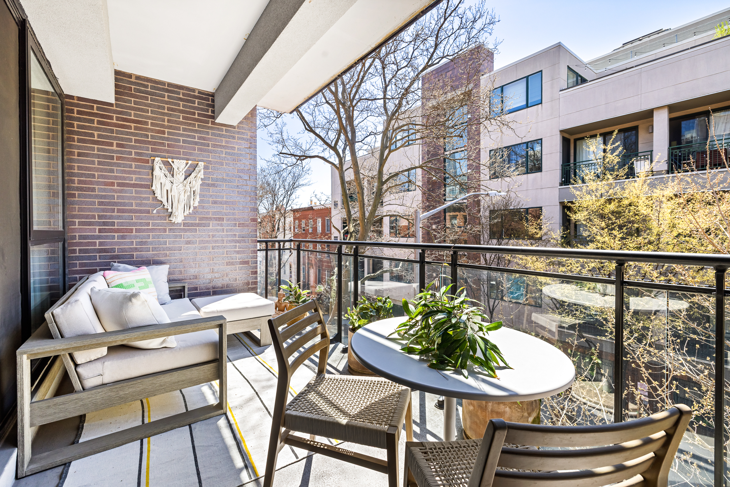 47 Dean Street, Unit 3B Brooklyn, NY 11201 - Photo 3 of 11 a balcony with table and chairs