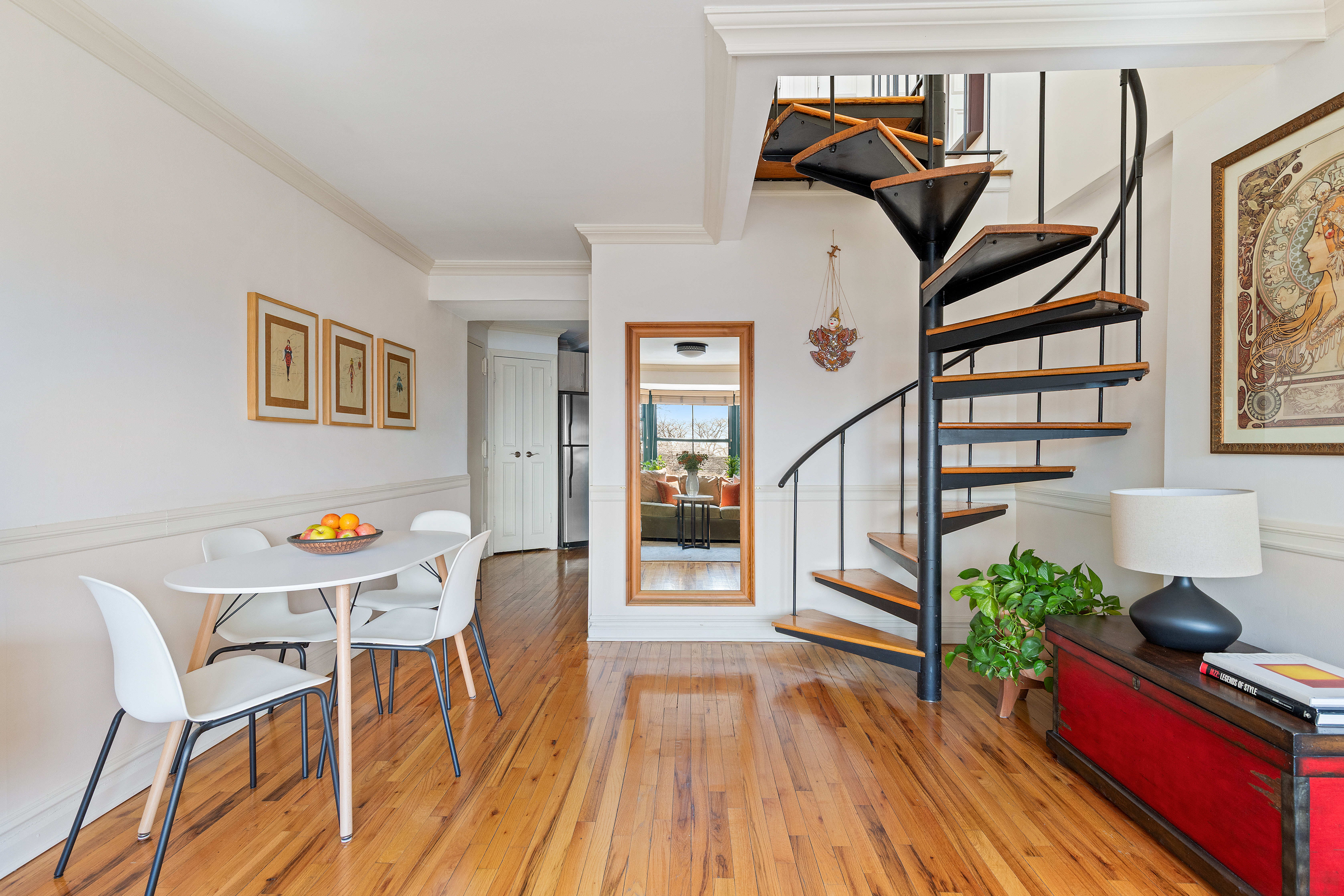 1139 Prospect Avenue, Unit 4G Brooklyn, NY 11218 - Photo 2 of 11 a view of a dining room with furniture a chandelier and wooden floor