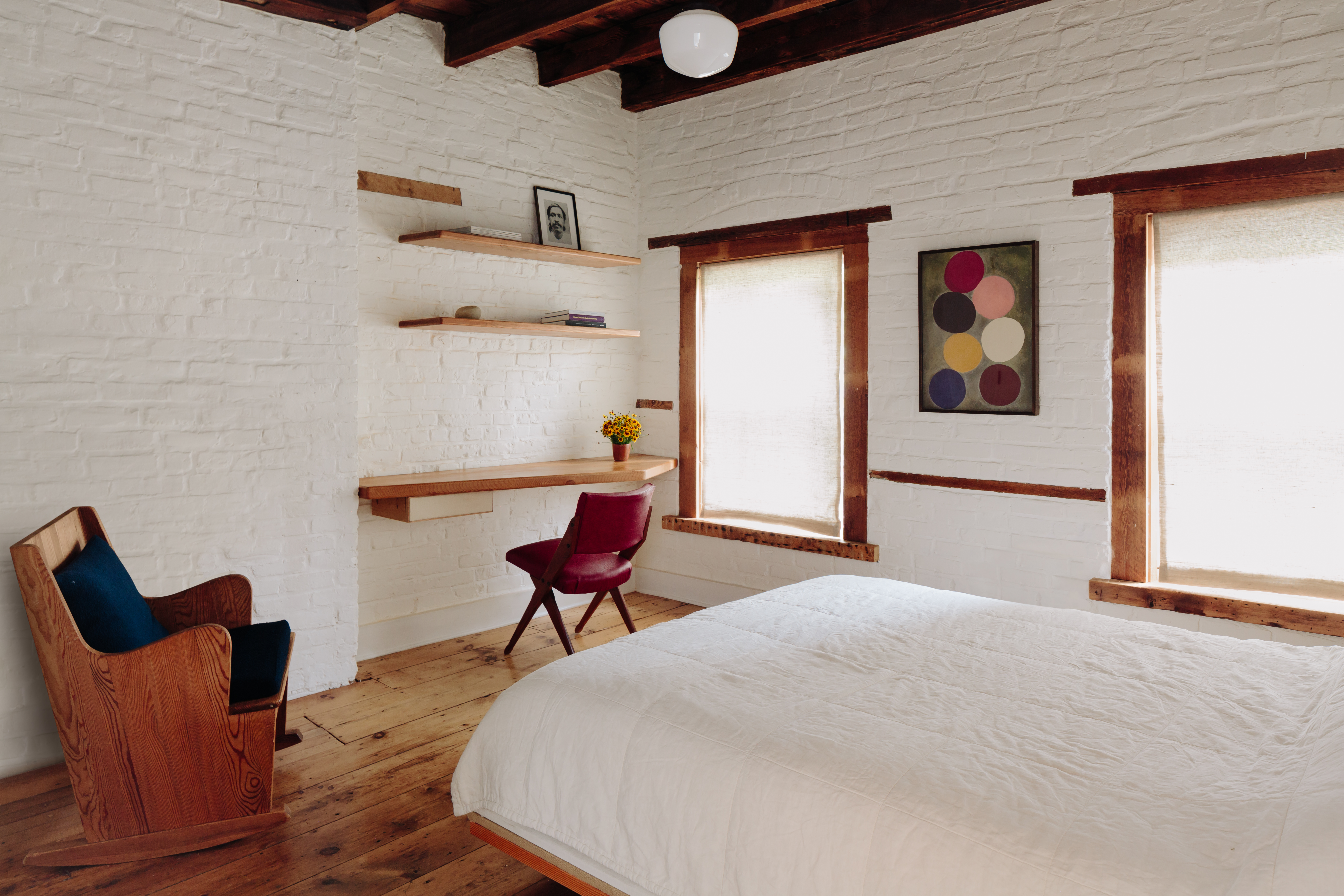 246 Bergen Street Brooklyn, NY 11217 - Photo 16 of 20 a bedroom with furniture and wooden floor