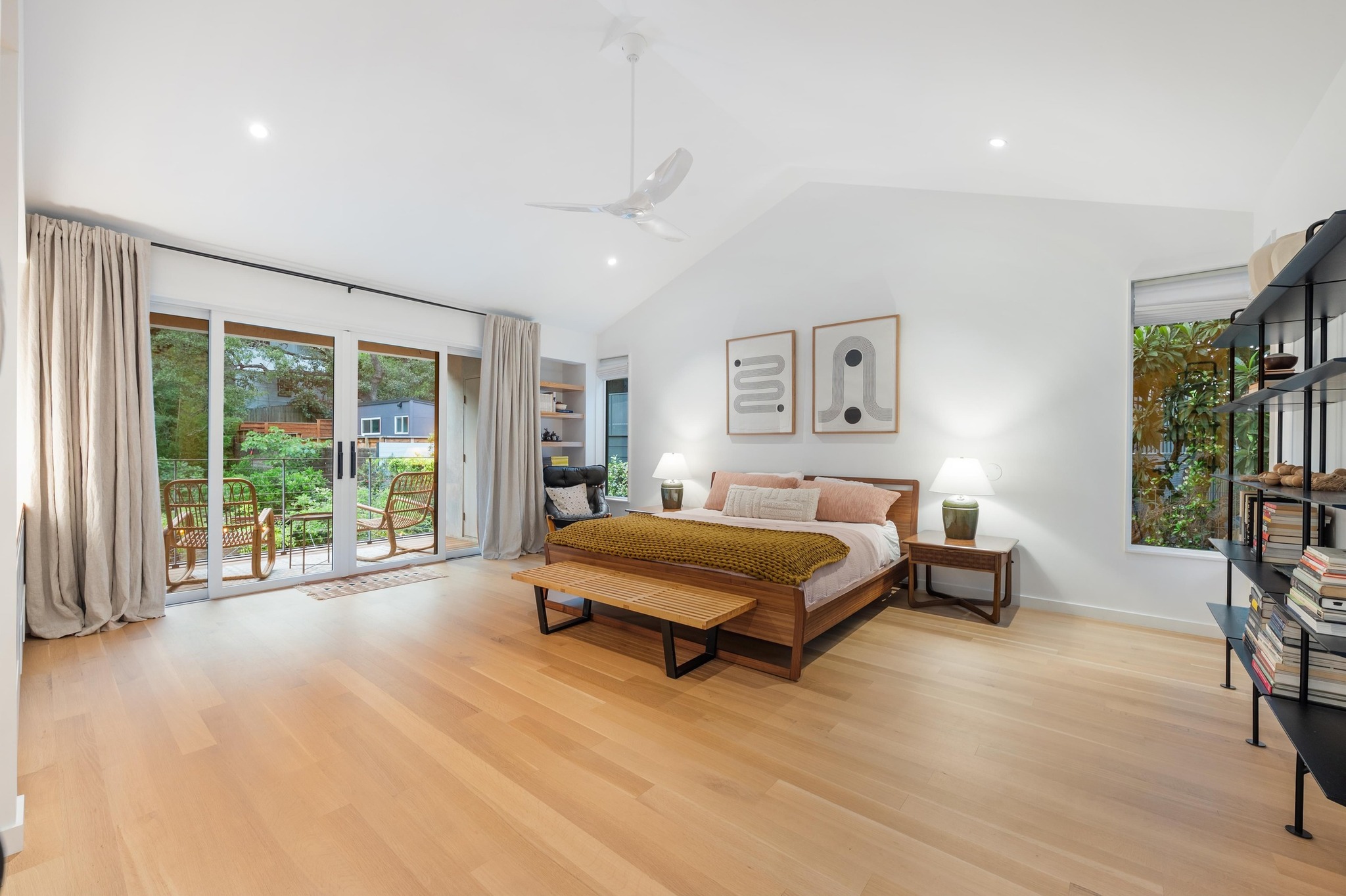 1206 Bickler Road Austin, TX 78704 - Photo 33 of 65 a spacious bedroom with a bed and a large window