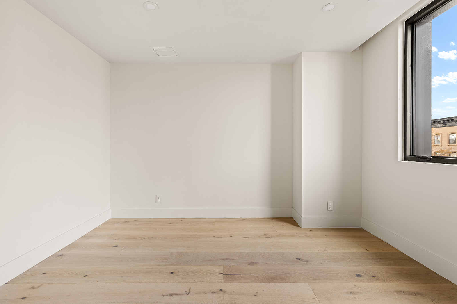 78 1st Place, Unit 5 Brooklyn, NY 11231 - Photo 14 of 24 an empty room with wooden floor and windows