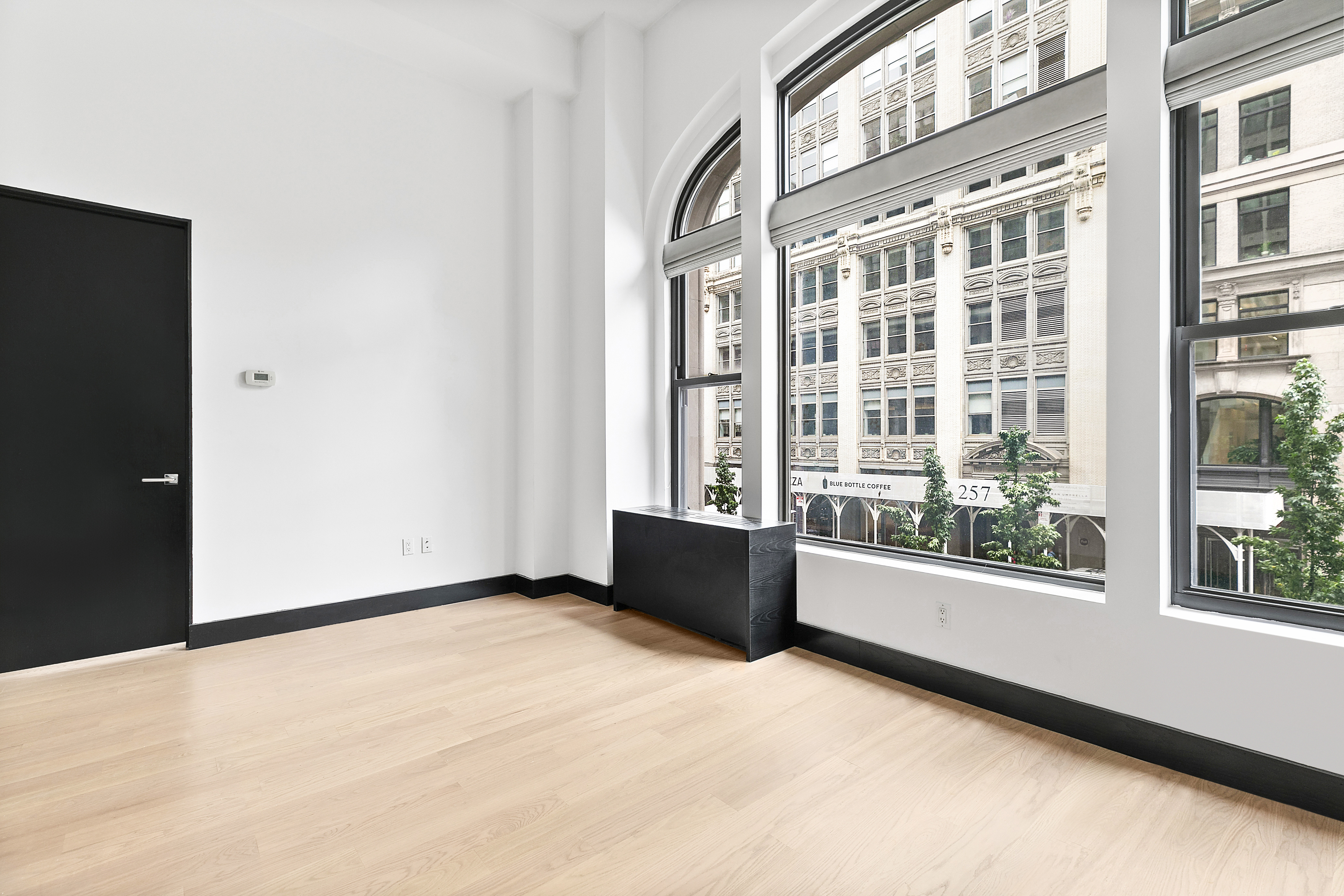 254 Park Avenue South, Unit 3C Manhattan, NY 10010 - Photo 2 of 9 a view of an empty room with a window