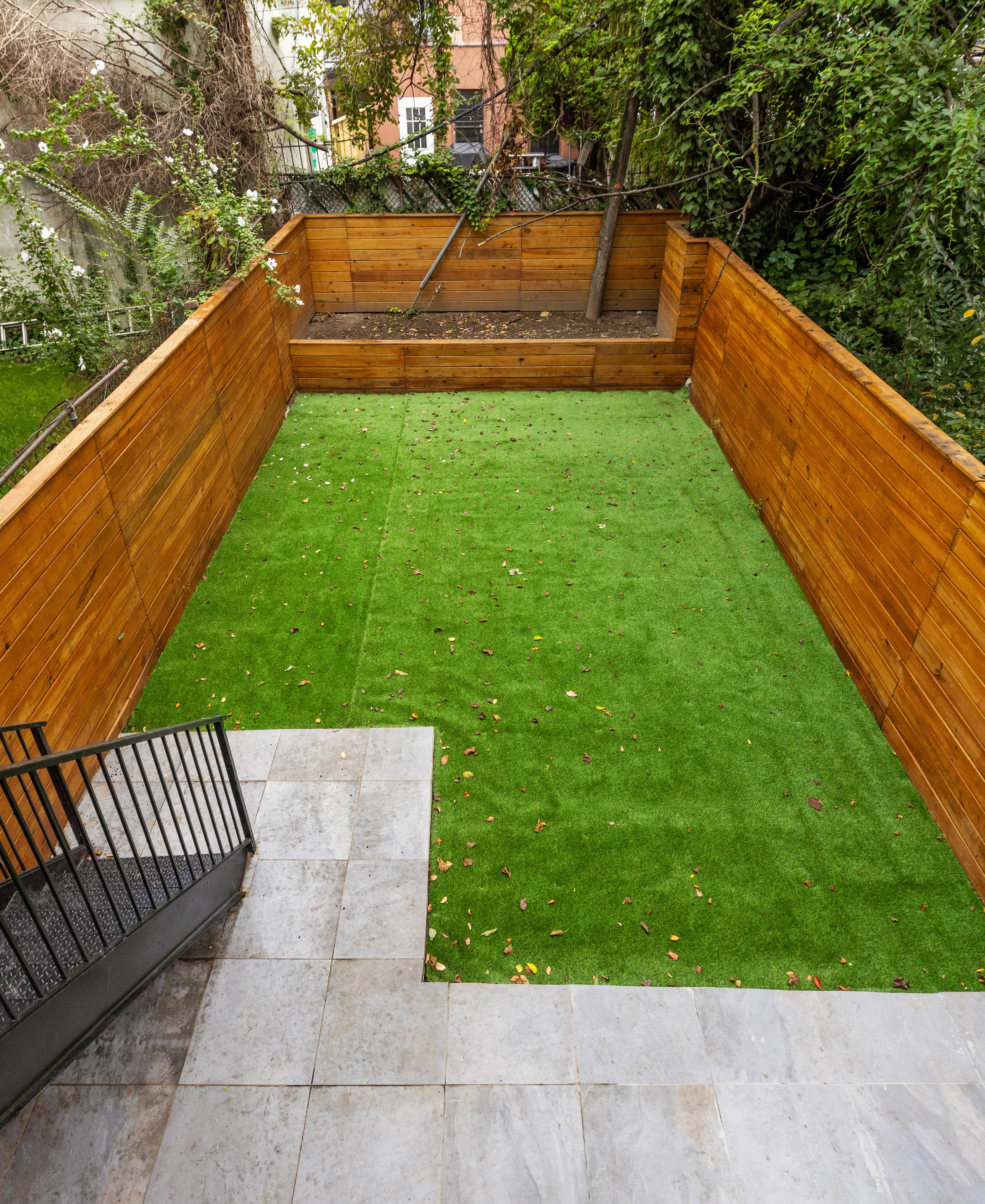 768 Halsey Street Brooklyn, NY 11233 - Photo 11 of 14 a view of a yard with a park