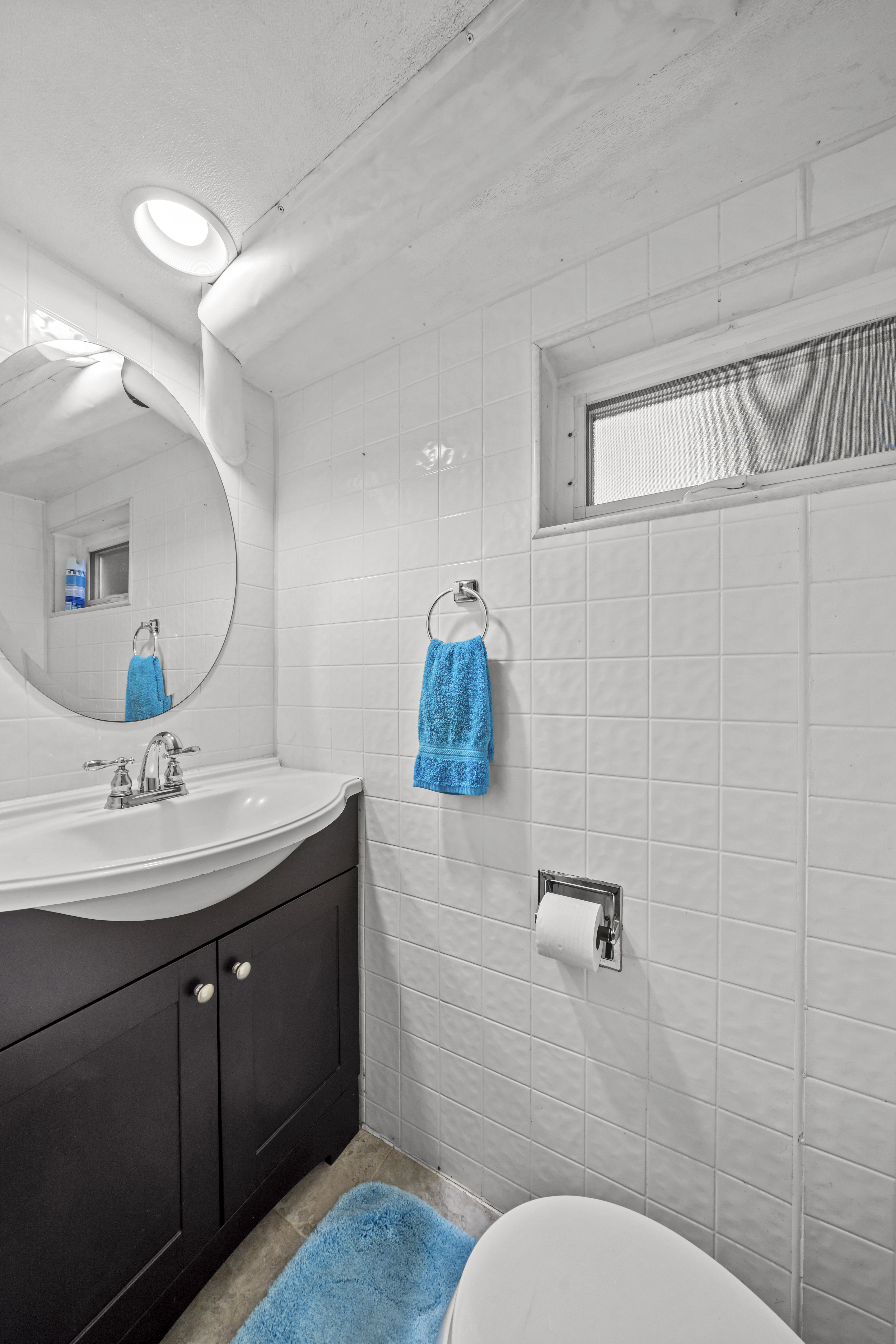 2018 Mill Avenue Brooklyn, NY 11234 - Photo 17 of 20 a bathroom with a granite countertop sink mirror and toilet