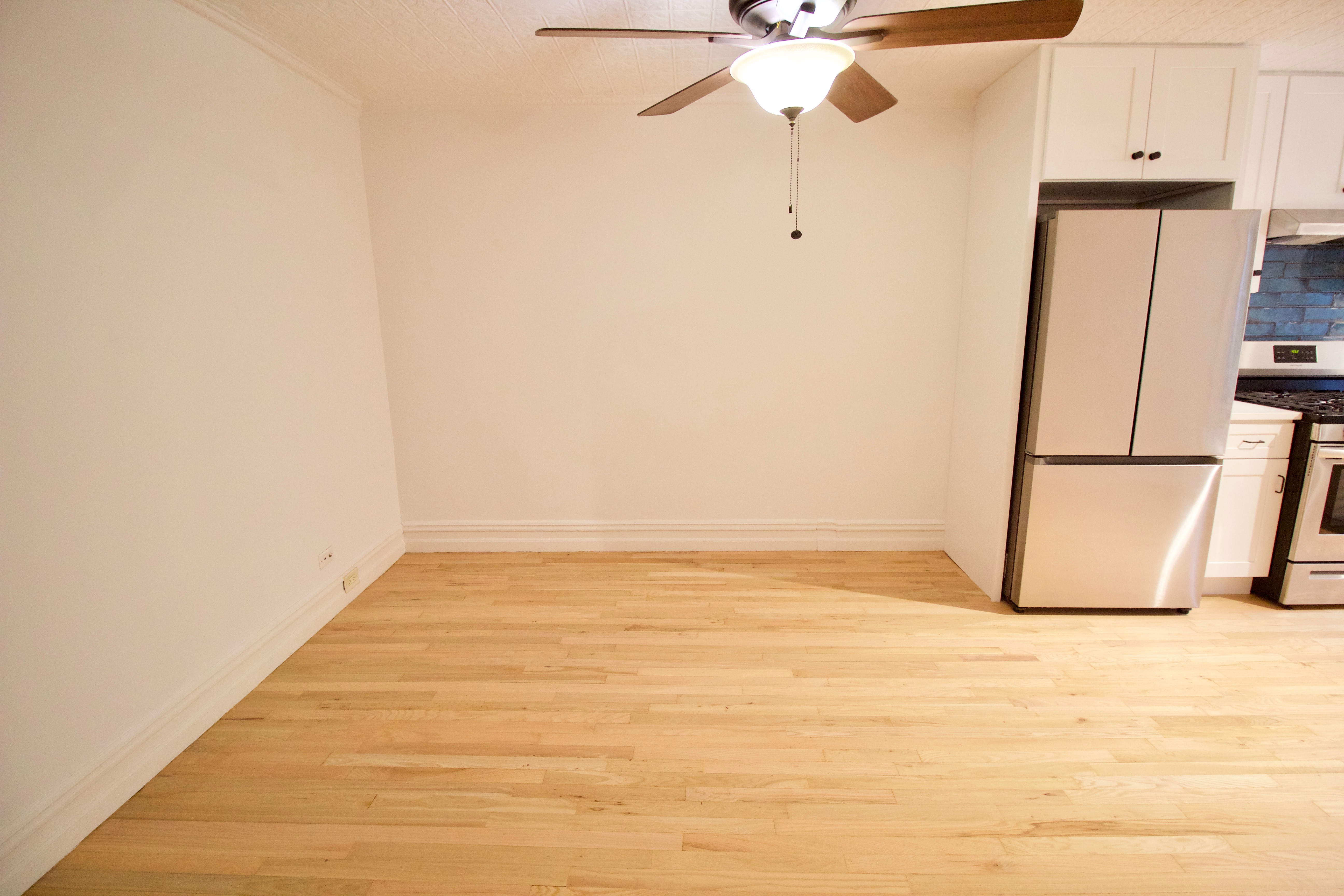 403 Caton Avenue, Unit 1 Brooklyn, NY 11218 - Photo 20 of 37 a view of a room with an empty space