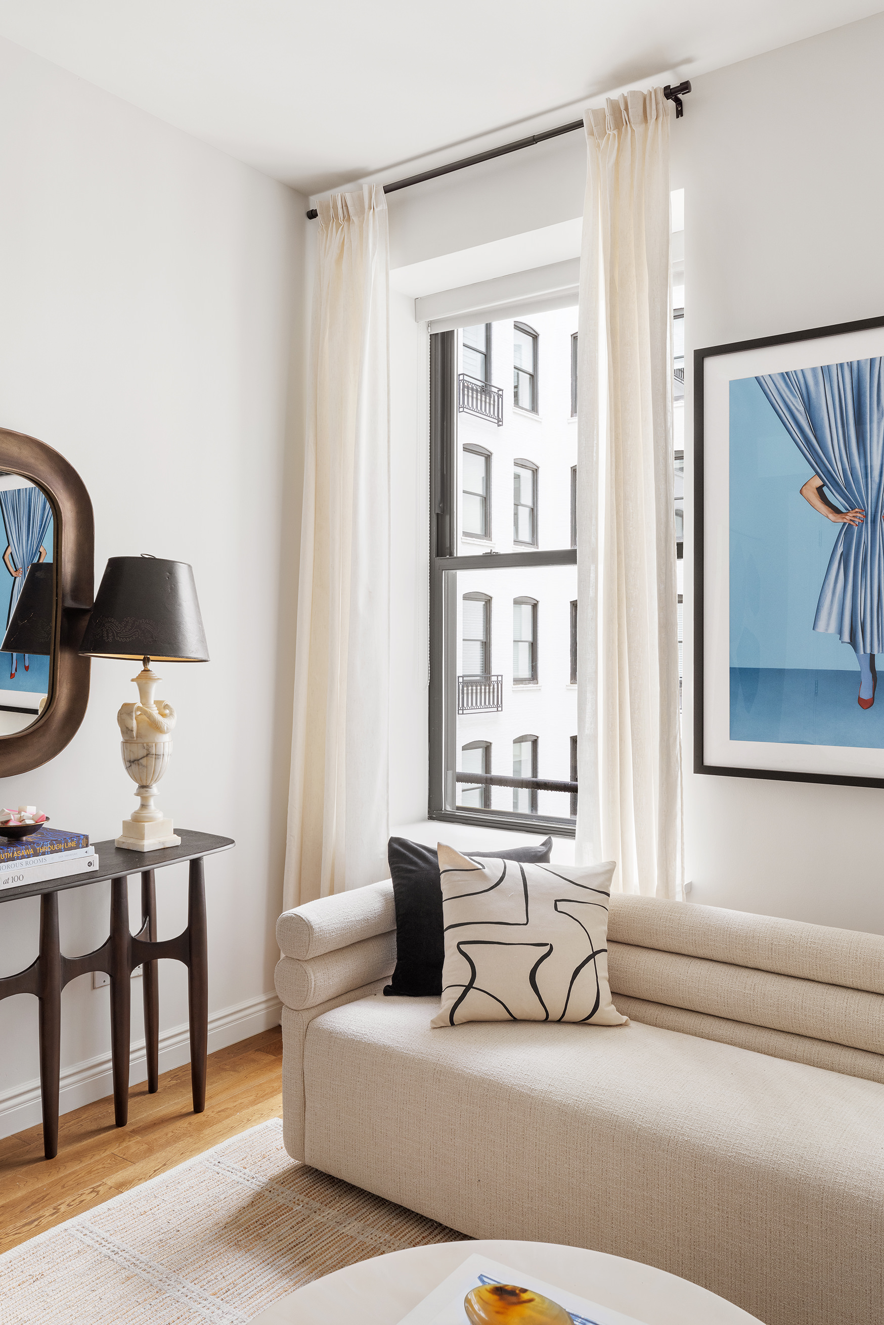 225 5th Avenue, Unit 6T Manhattan, NY 10010 - Photo 2 of 12 a living room with furniture