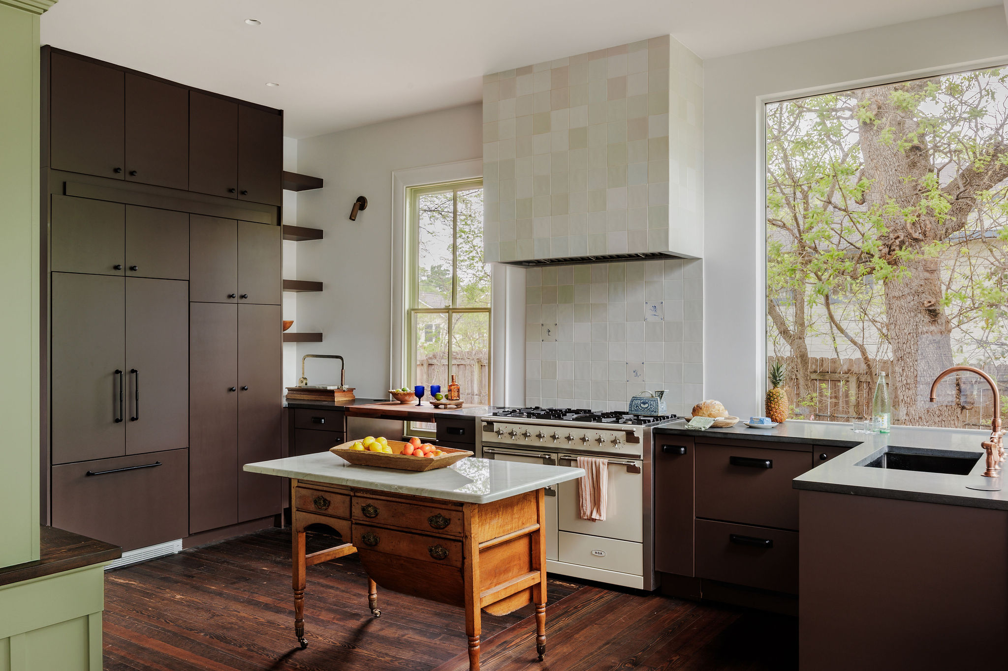 606 West 35th Street Austin, TX 78705 - Photo 16 of 37 a kitchen with a sink stove and refrigerator