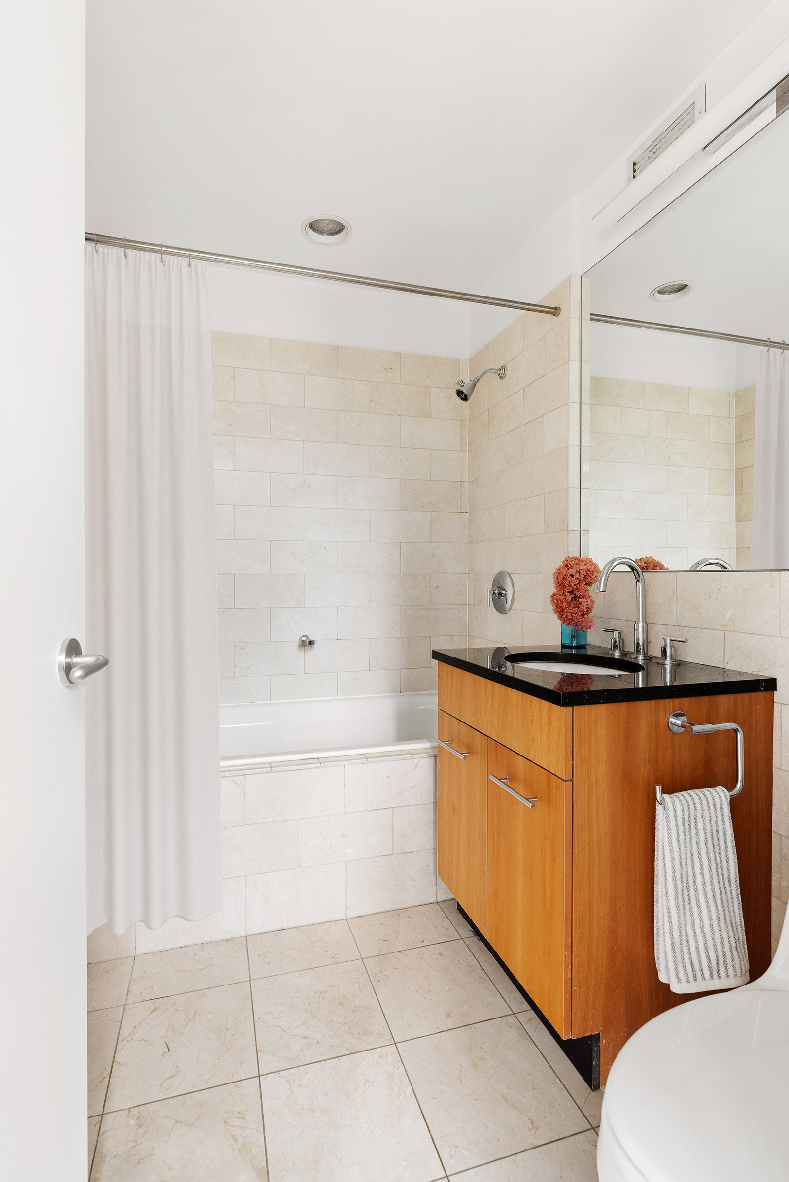 11 East 29th Street, Unit 7B Manhattan, NY 10016 - Photo 5 of 6 a bathroom with a bathtub and a shower