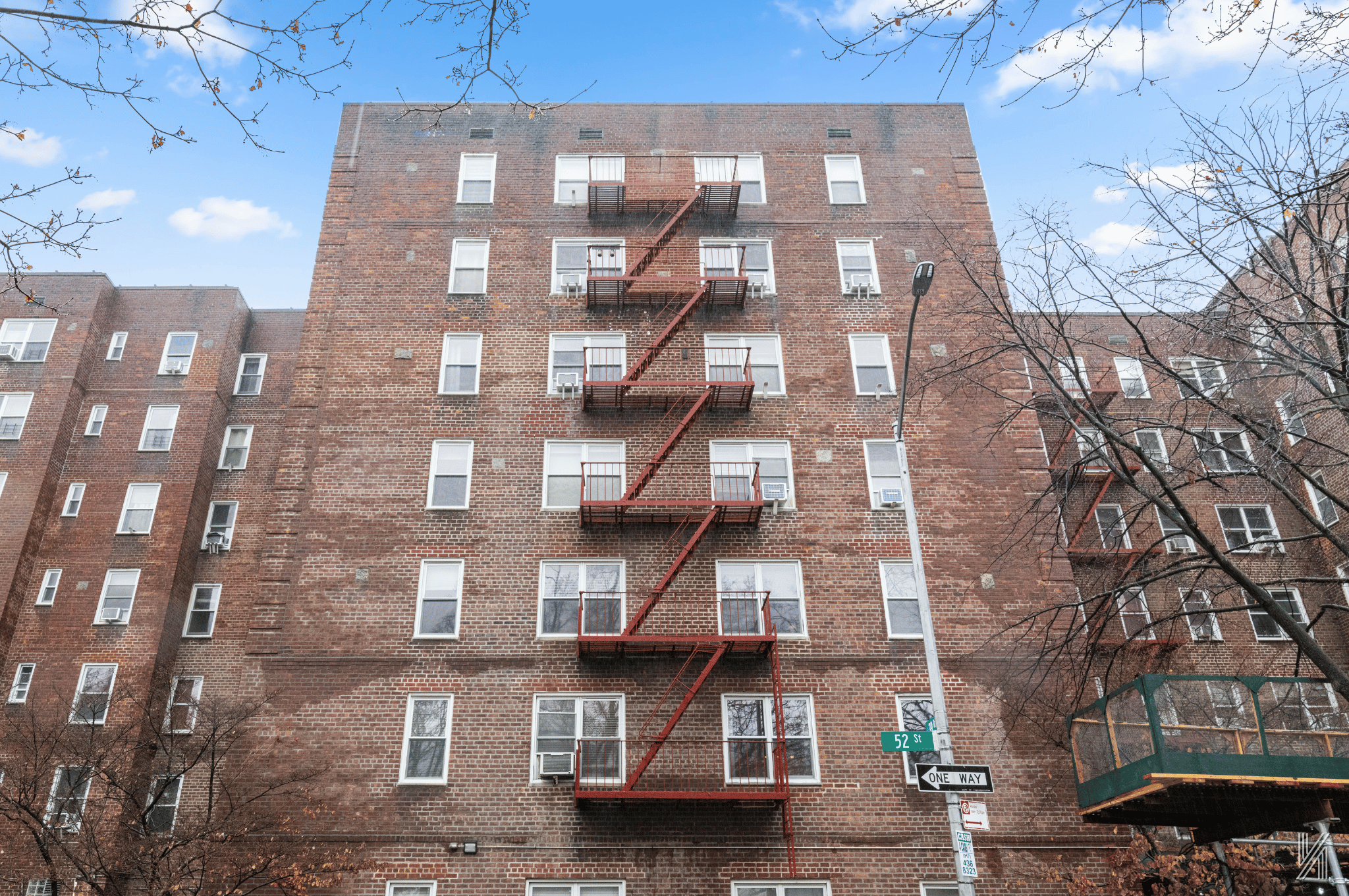 39-30 52nd Street, Unit GA Queens, NY 11377 - Photo 14 of 15 a front view of a building