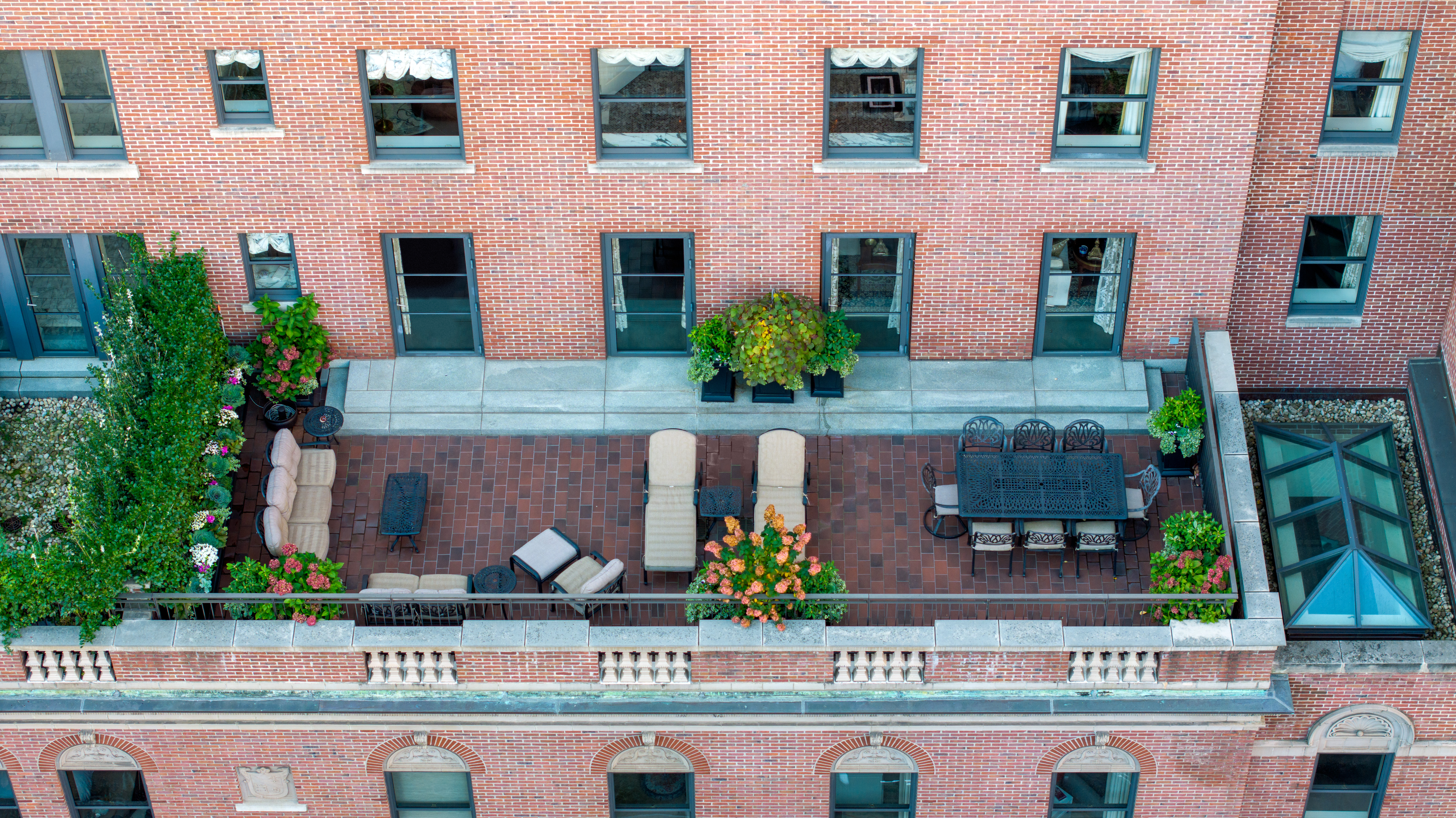 150 West 12th Street, Unit 3WEST Manhattan, NY 10011 - Photo 4 of 39 a front view of building with yard and seating area