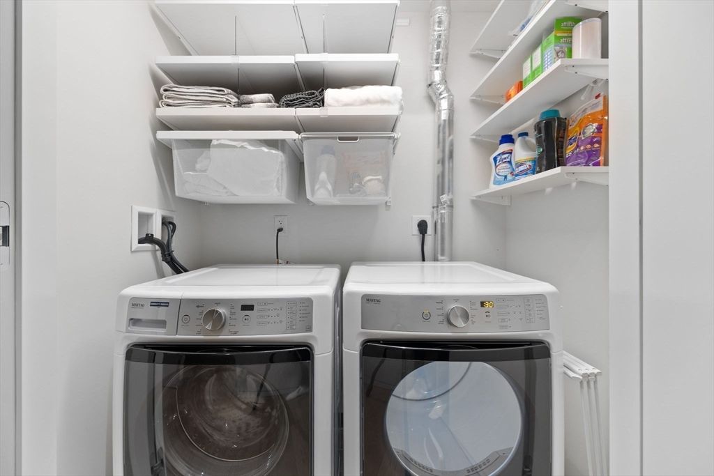 a view of a patio with couches chairs and a yard