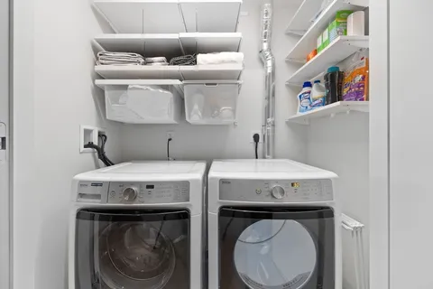 a view of a patio with couches chairs and a yard