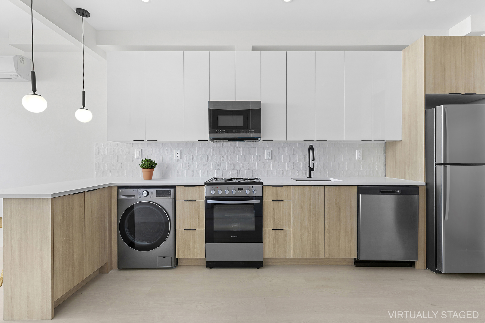 647 Dekalb Avenue, Unit 3B Brooklyn, NY 11216 - Photo 4 of 5 a kitchen with cabinets and stainless steel appliances