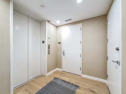 a view of building with yard and swimming pool