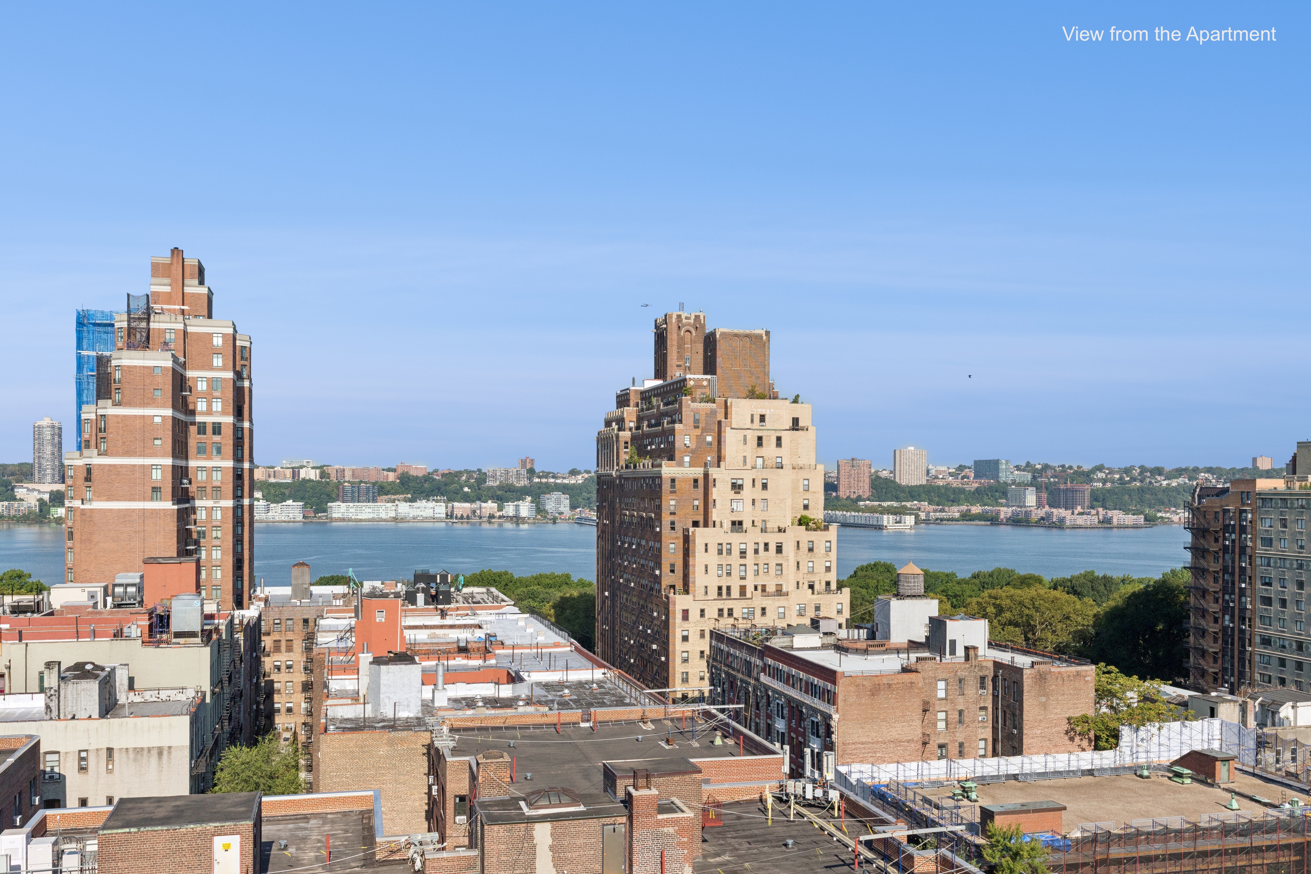 710 West End Avenue, Unit 14B Manhattan, NY 10025 - Photo 3 of 19 a view of a city with tall buildings
