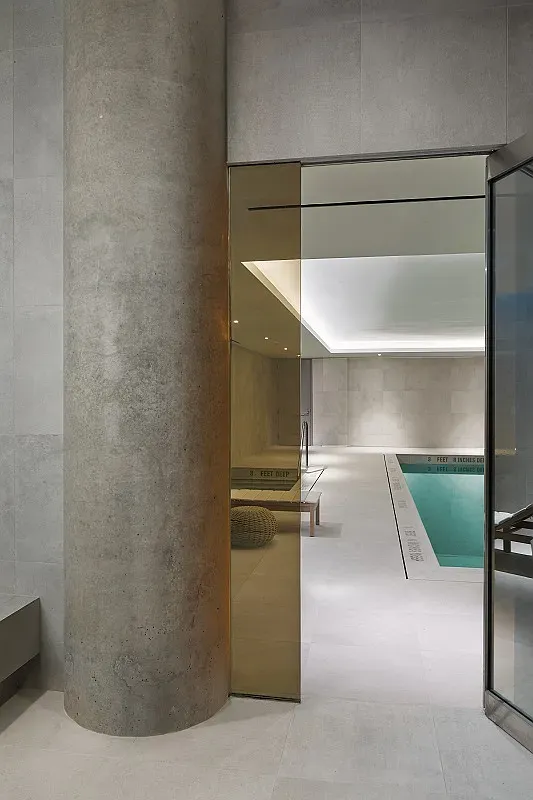 a view of a brick house with many windows