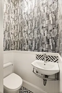 a bathroom with a sink and toilet