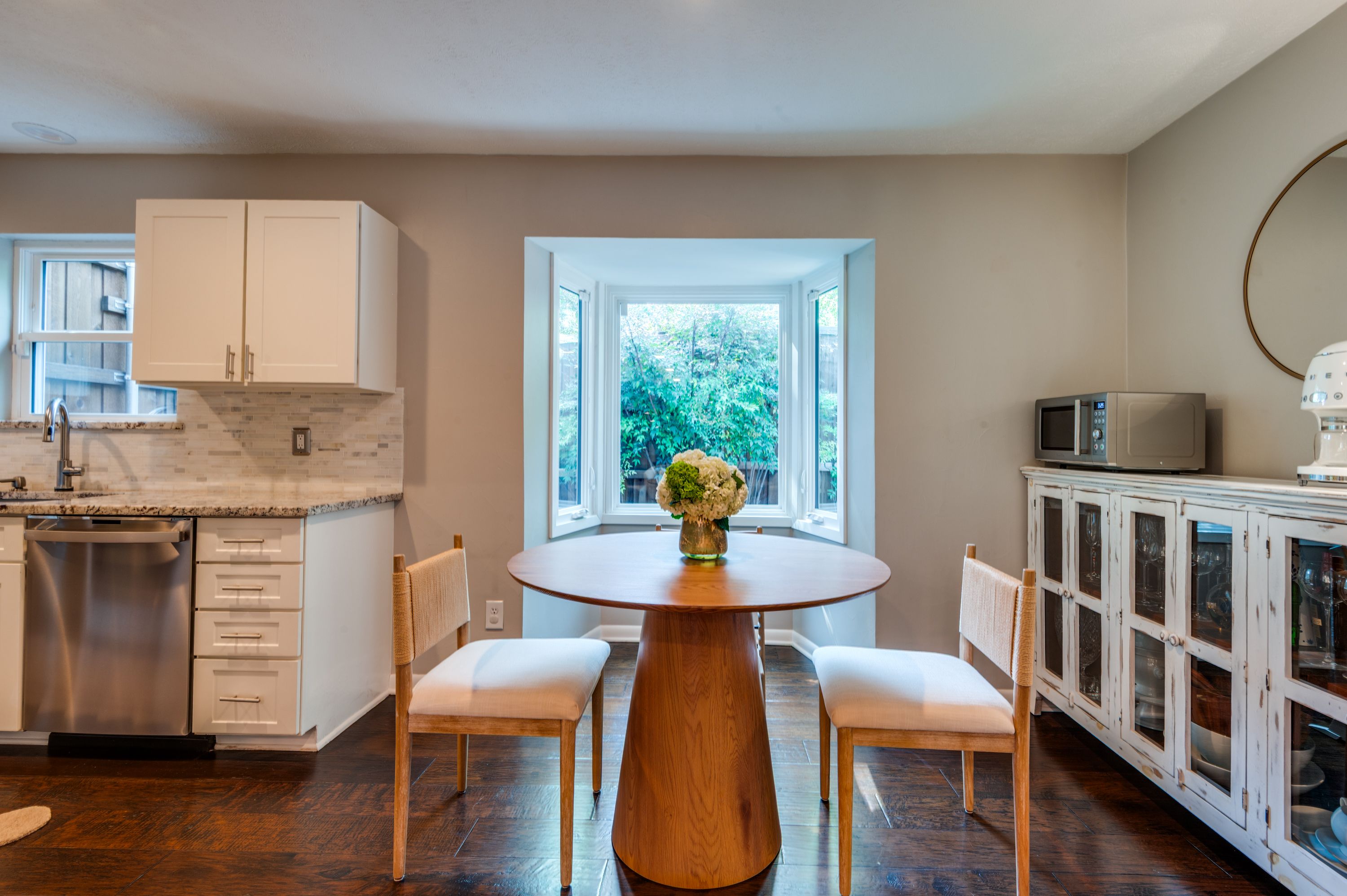 3363 Merrell Road Dallas, TX 75229 - Photo 10 of 29 a view of a dining room with furniture window and wooden floor