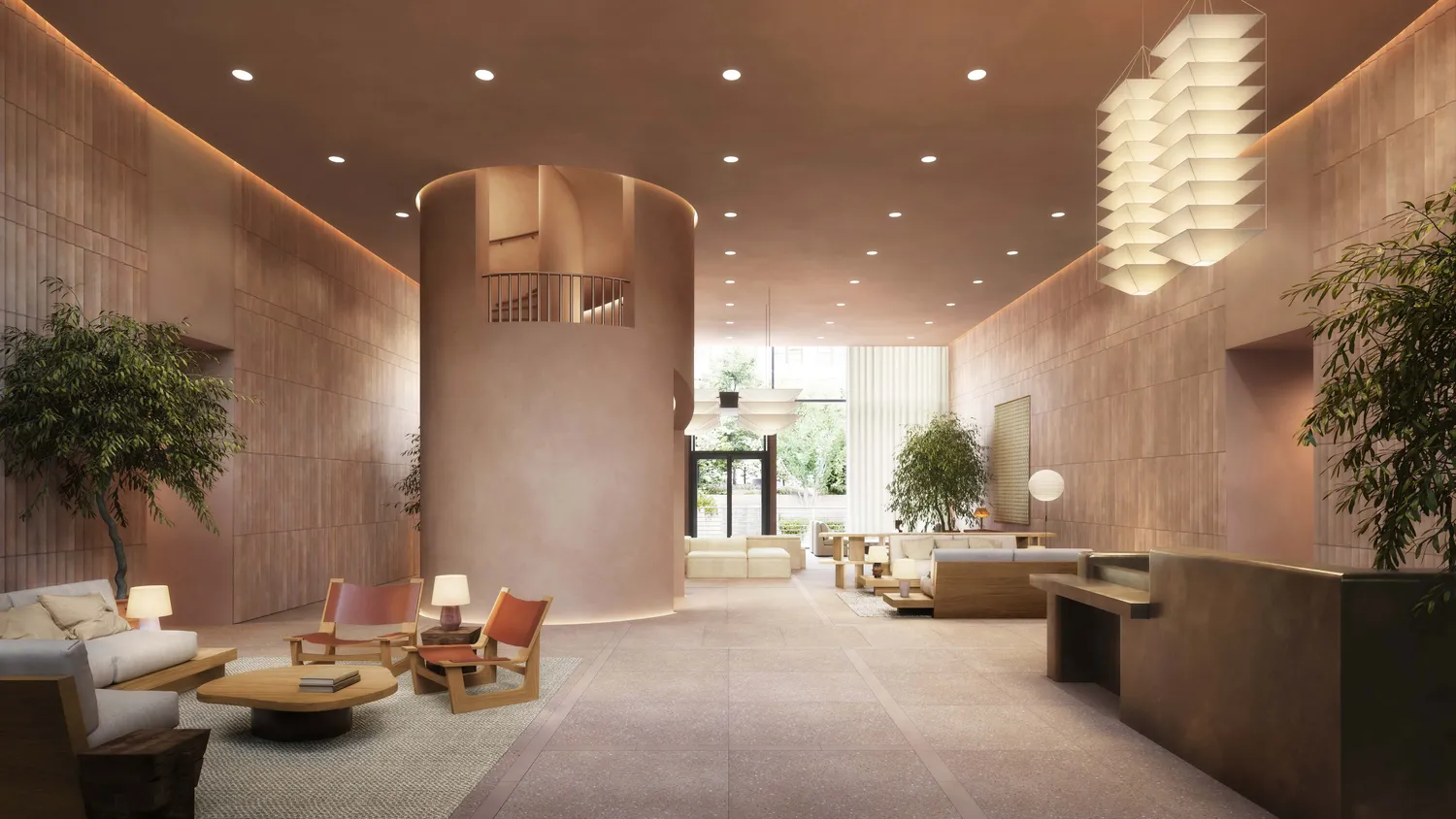 a living room with furniture and a potted plant