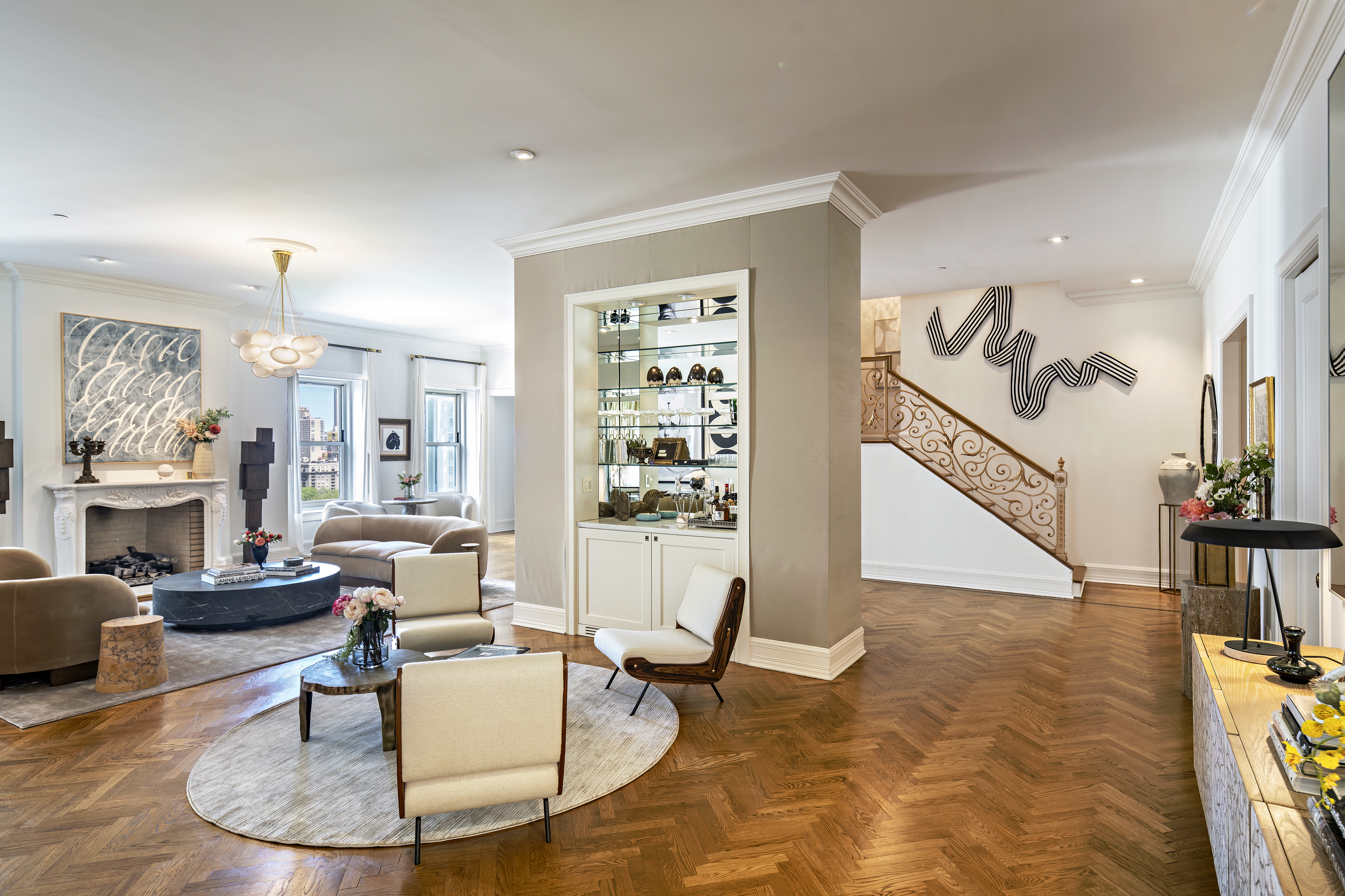 1 Central Park South, Unit 1801/1901 Manhattan, NY 10019 - Photo 4 of 21 a living room with furniture and a dining table