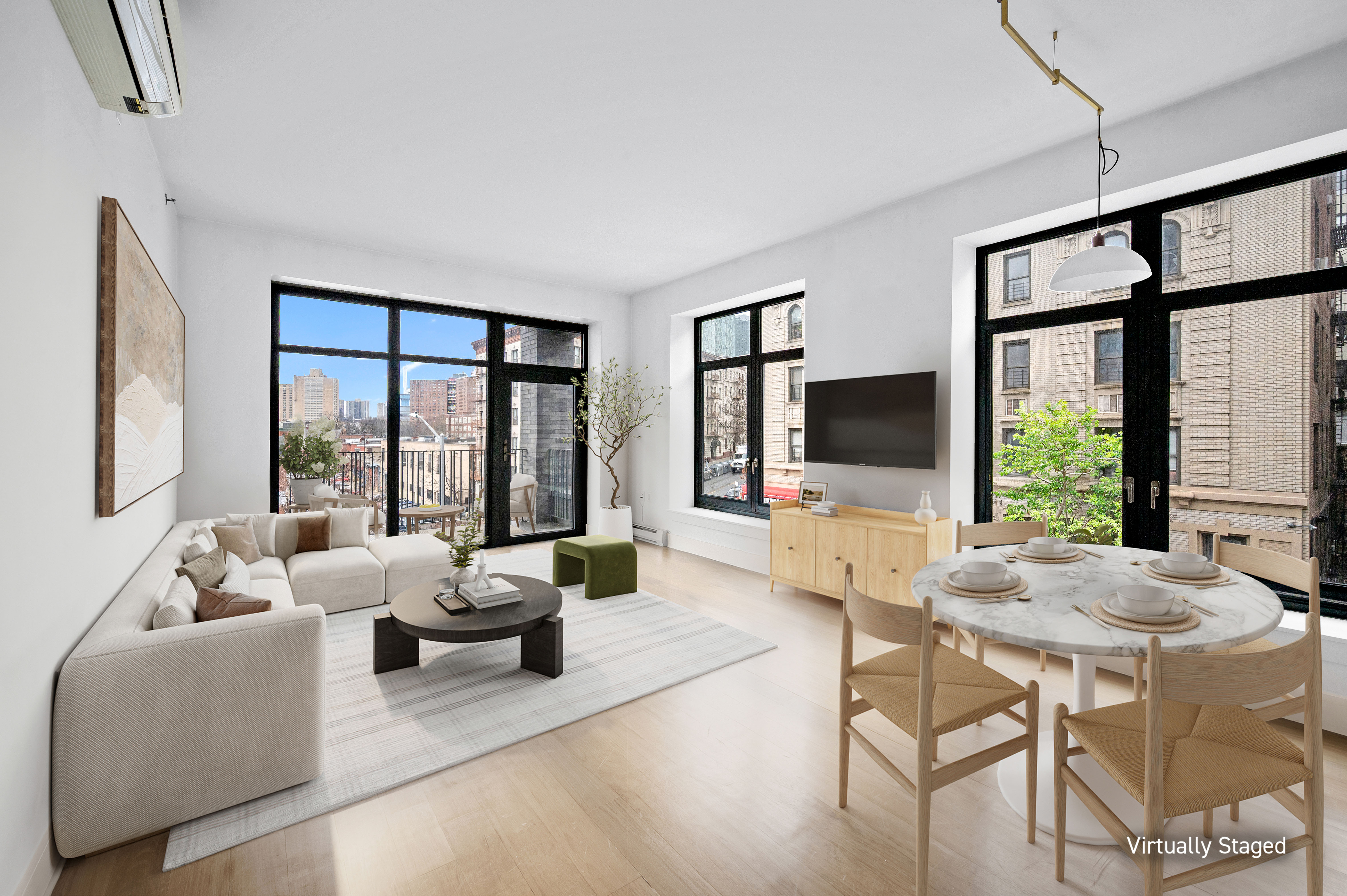 17 Convent Avenue Manhattan, NY 10027 - Photo 1 of 15 a living room with furniture tv and large windows